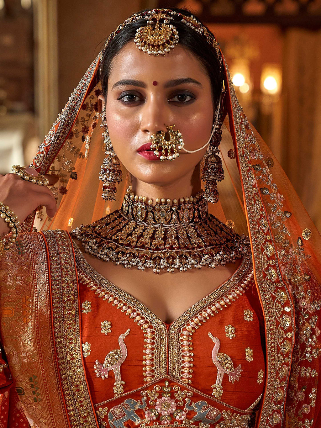 Enchanting Orange Pearl Work Silk Bridal Wear Lehenga Choli With Double Dupatta