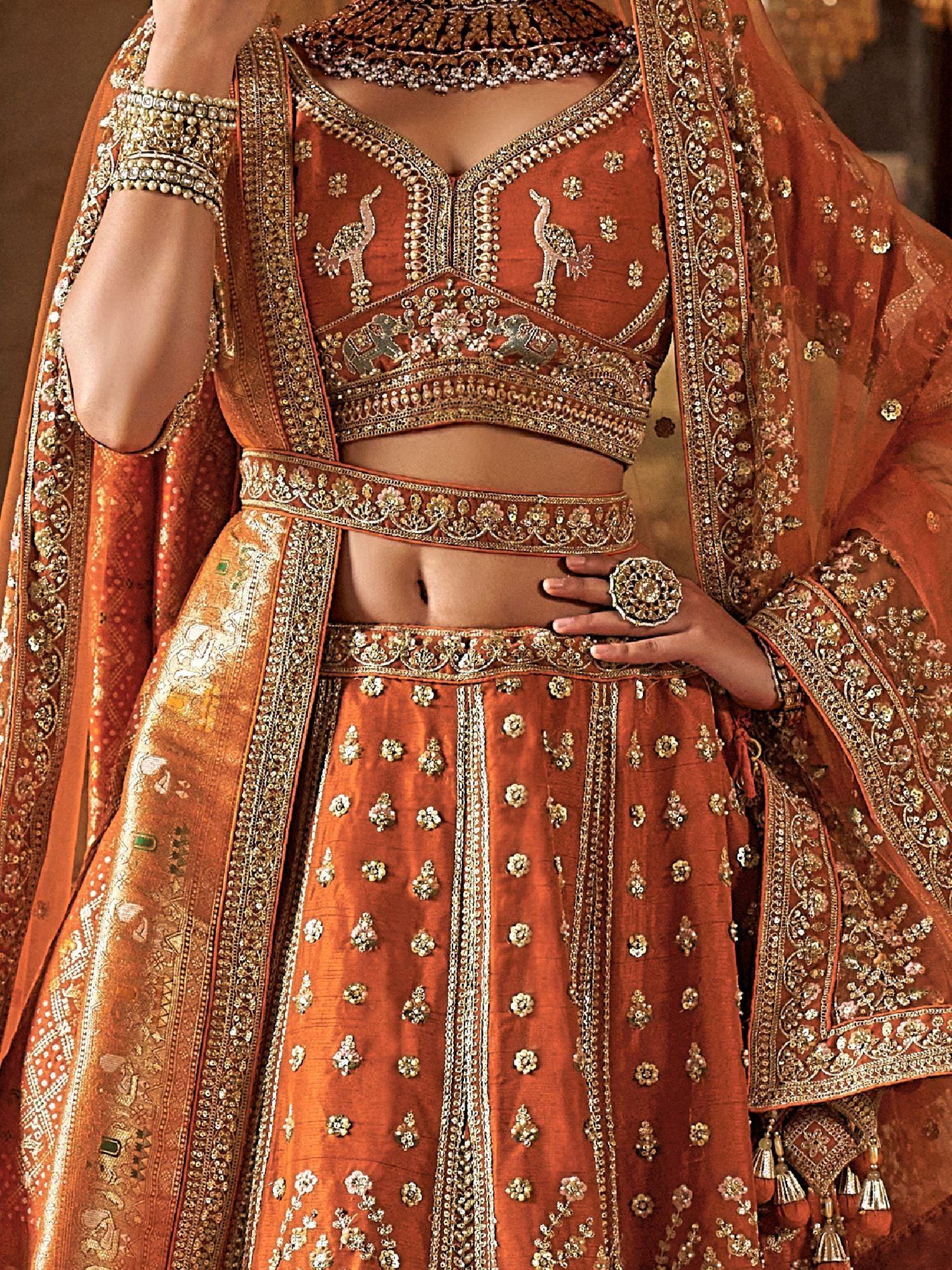 Enchanting Orange Pearl Work Silk Bridal Wear Lehenga Choli With Double Dupatta