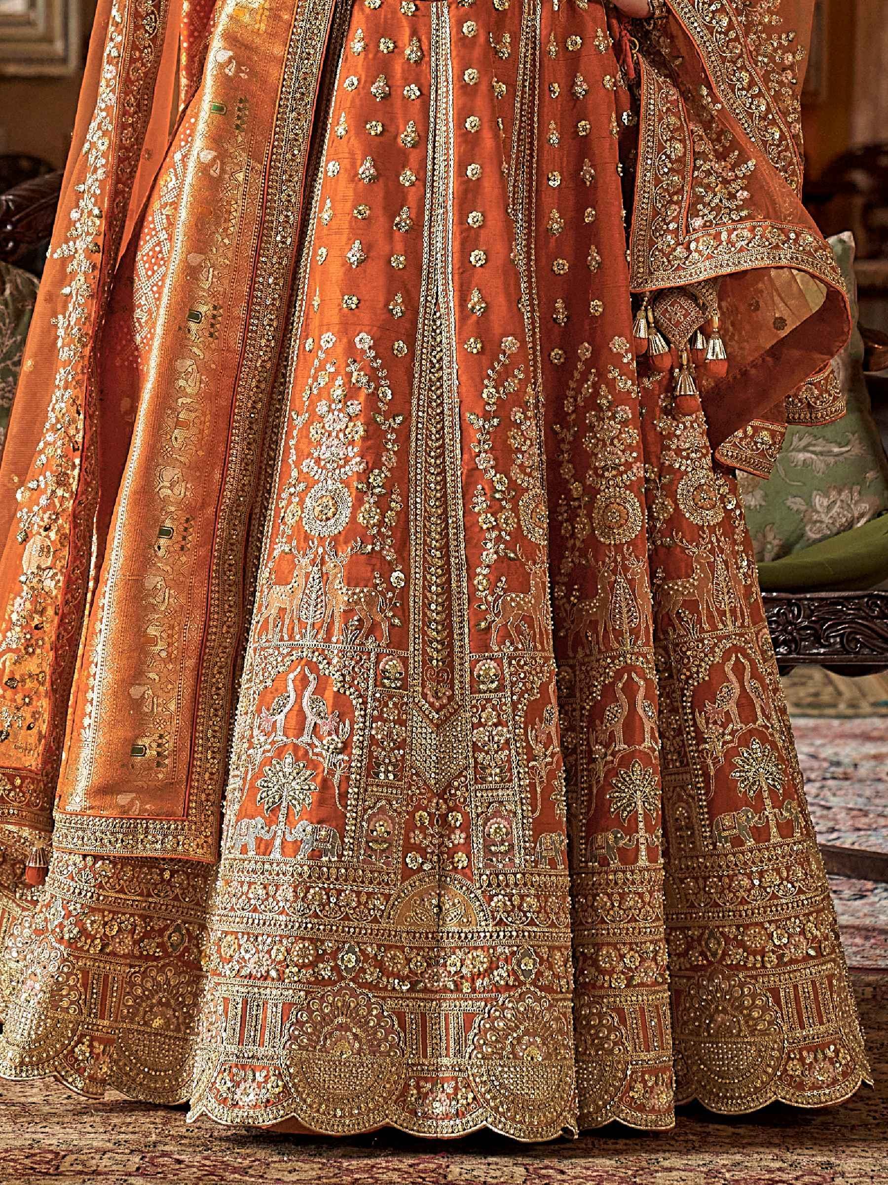 Enchanting Orange Pearl Work Silk Bridal Wear Lehenga Choli With Double Dupatta