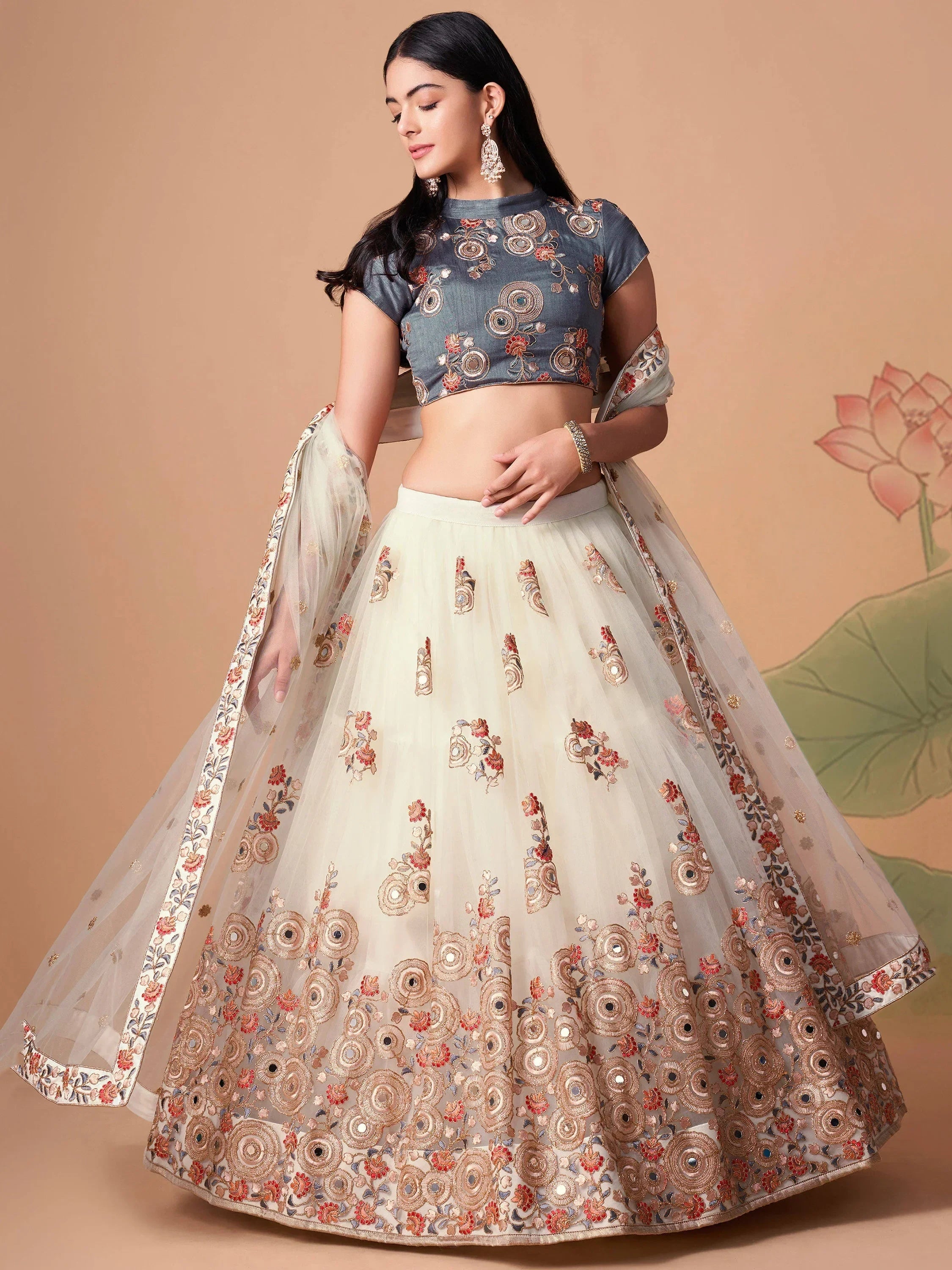 Ivory Pretty Embroidered Net Party Wear Lehenga Choli