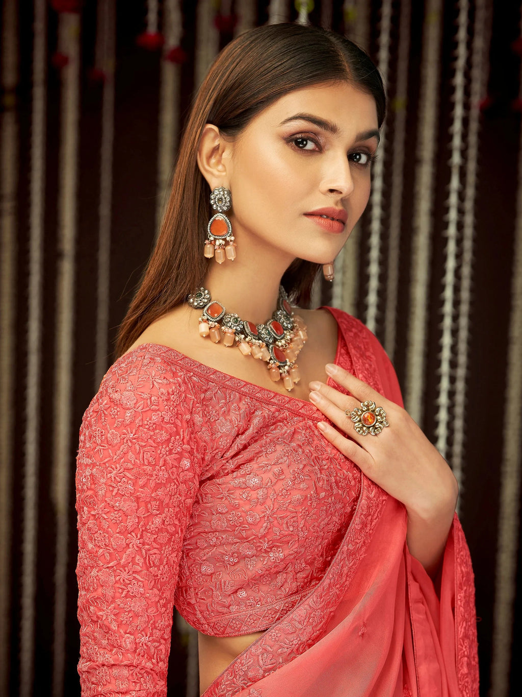 Impressive Peach Thread Embroidered Georgette Festival Wear Saree