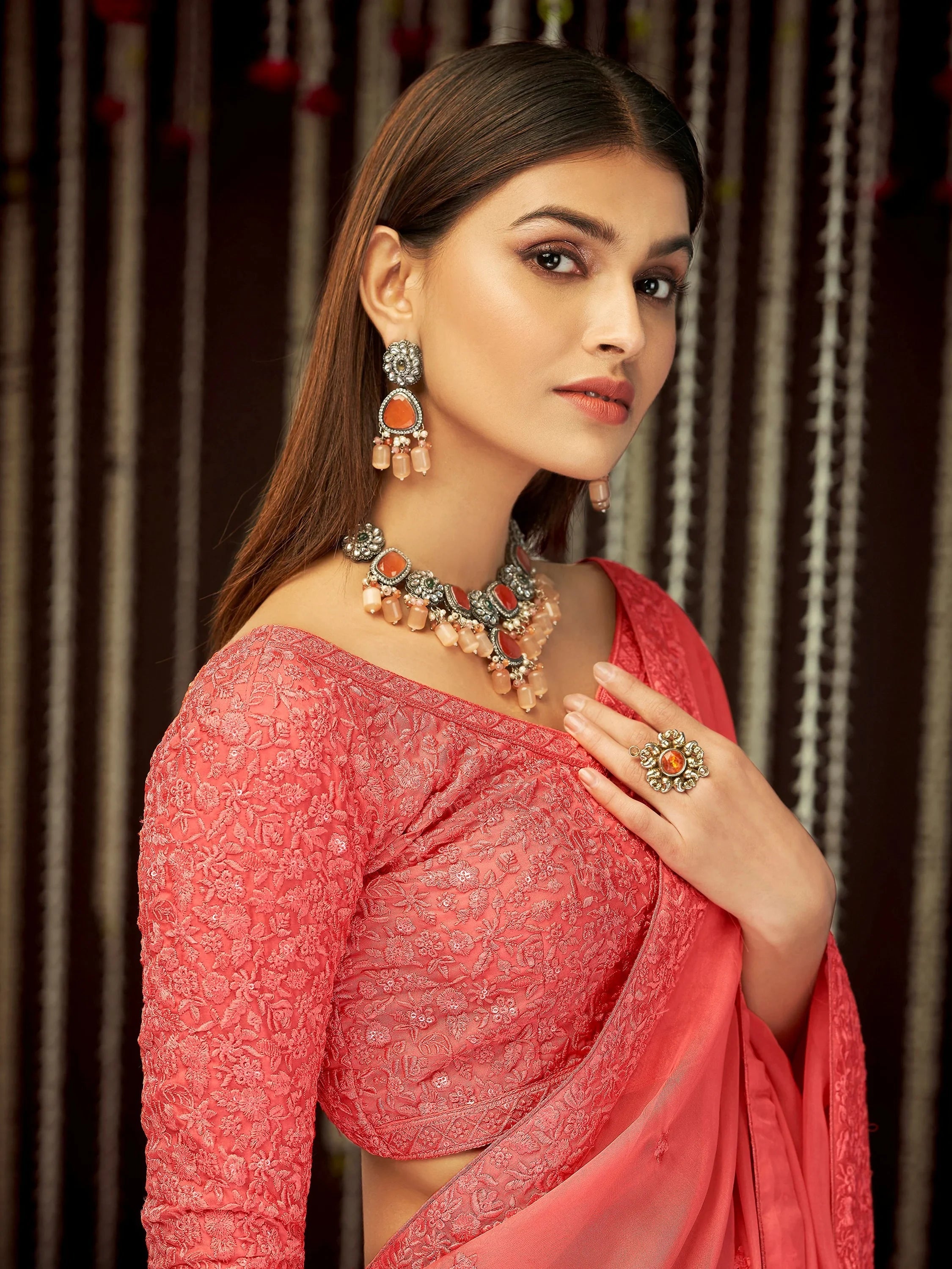 Impressive Peach Thread Embroidered Georgette Festival Wear Saree