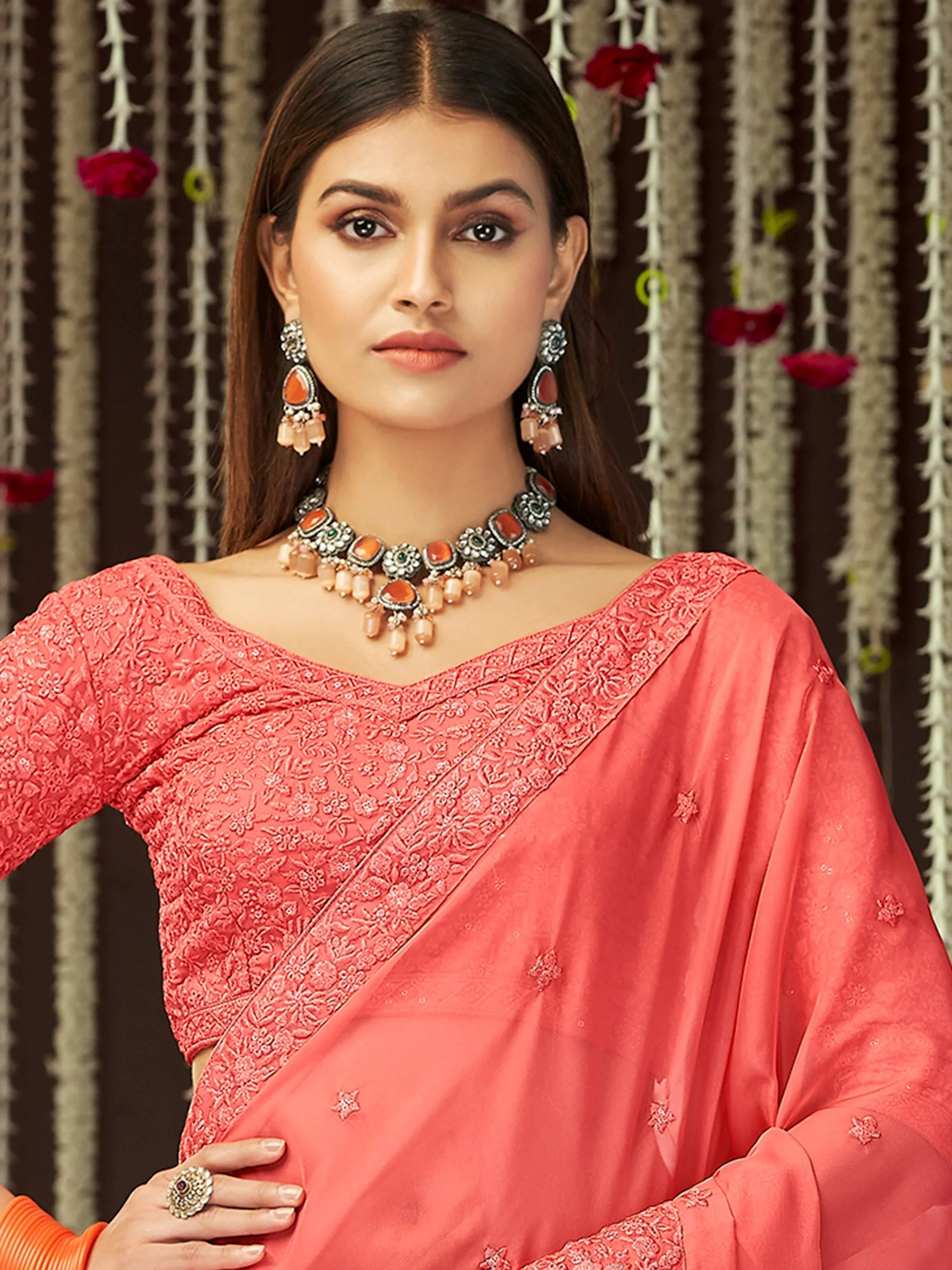 Impressive Peach Thread Embroidered Georgette Festival Wear Saree