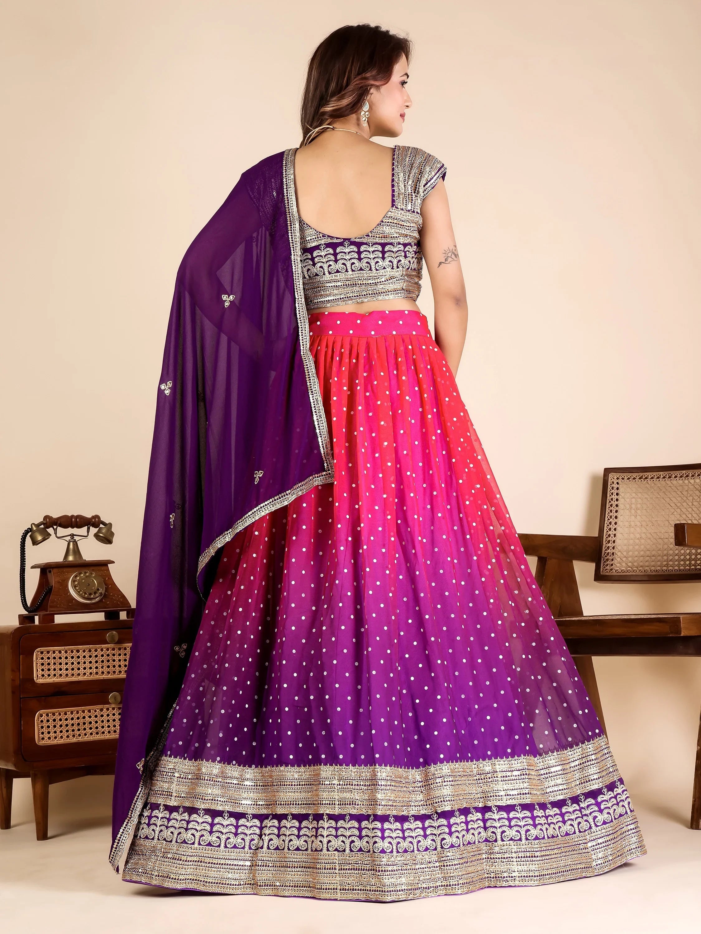 Stylist Purple Embroidered Georgette Festive Wear Lehenga Choli
