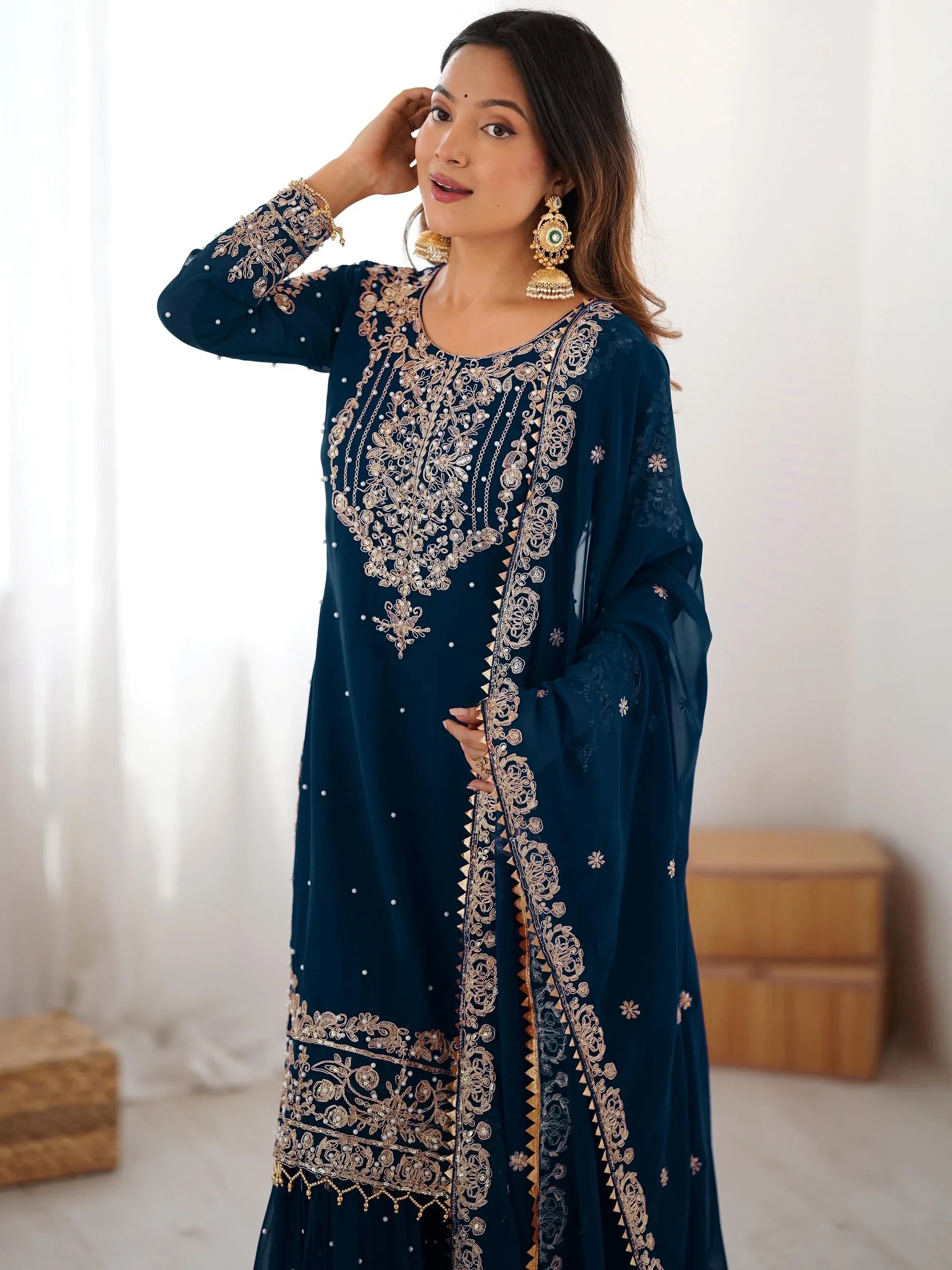 Mesmerizing Blue Embroidered Georgette Festival Wear Sharara Suit