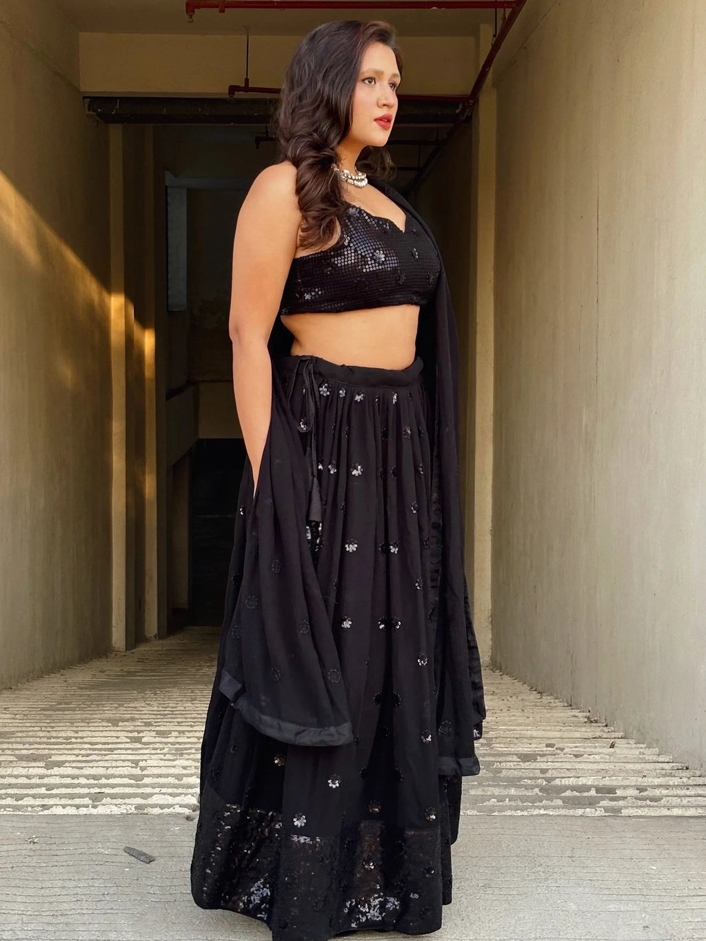 Wonderful Black Sequins Georgette Reception Wear Lehenga Choli