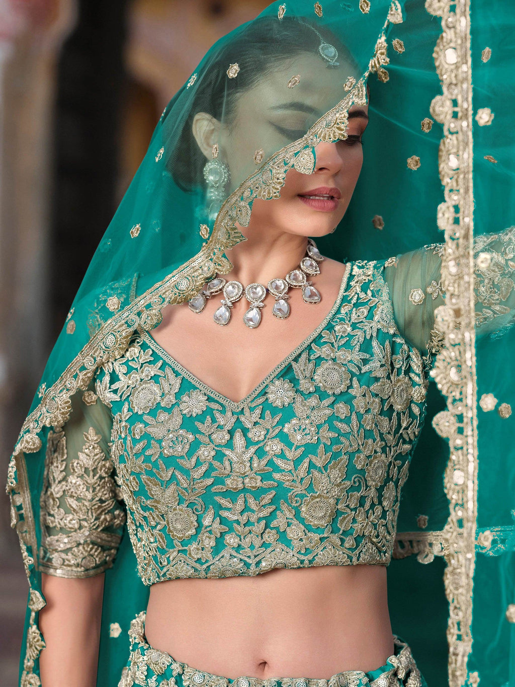 Teal Alluring Sequins Net Engagement Wear Lehenga Choli With Dupatta
