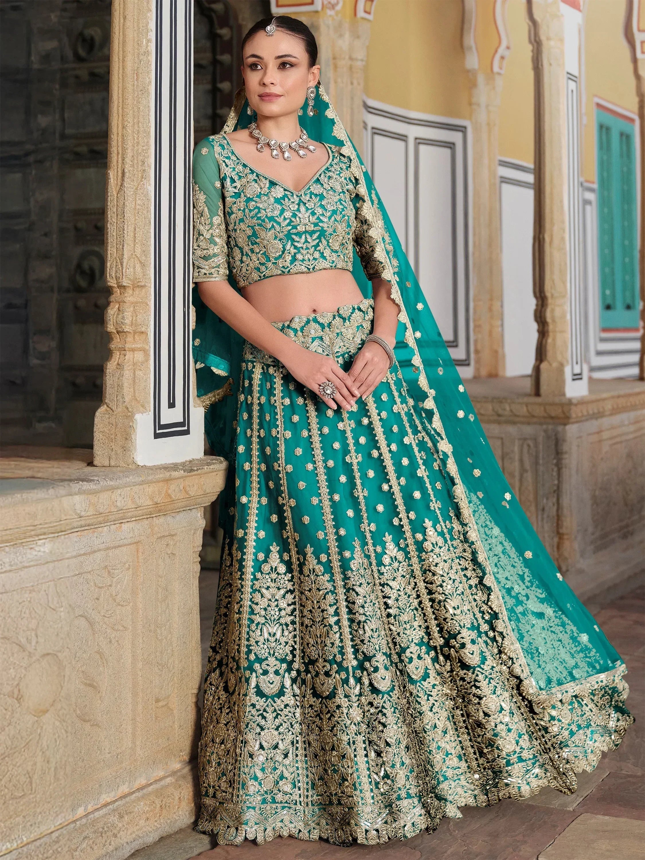 Teal Alluring Sequins Net Engagement Wear Lehenga Choli With Dupatta