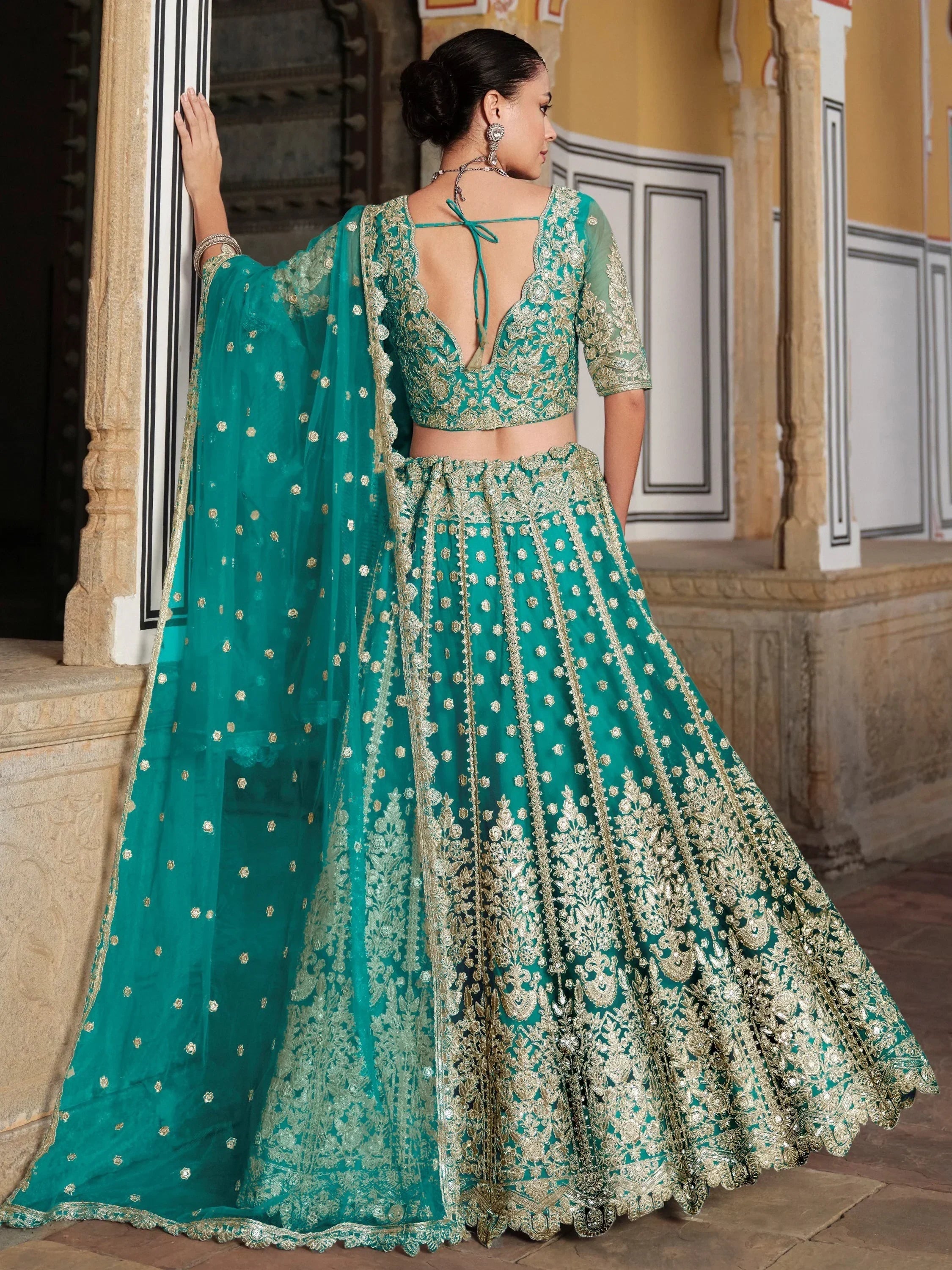 Teal Alluring Sequins Net Engagement Wear Lehenga Choli With Dupatta