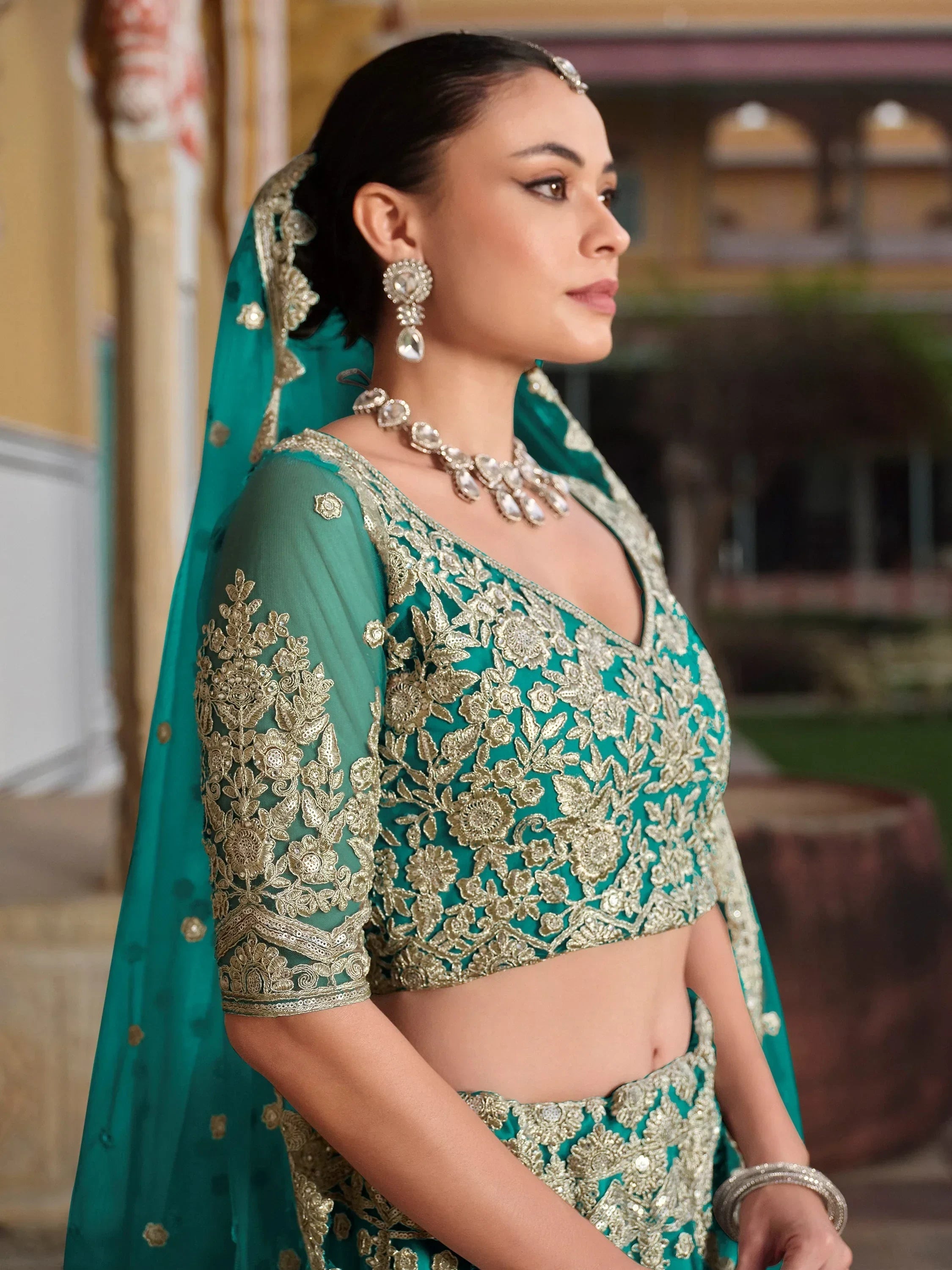 Teal Alluring Sequins Net Engagement Wear Lehenga Choli With Dupatta