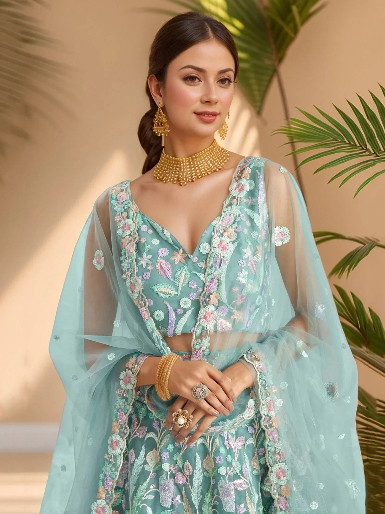 Dazzling Sky-Blue Sequins Net Engagement Wear Lehenga Choli
