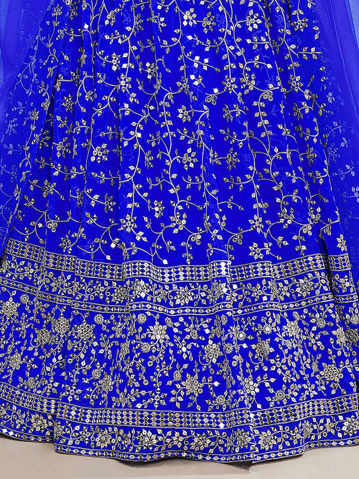 Mesmerizing Blue Sequins Georgette Wedding Wear Lehenga Choli