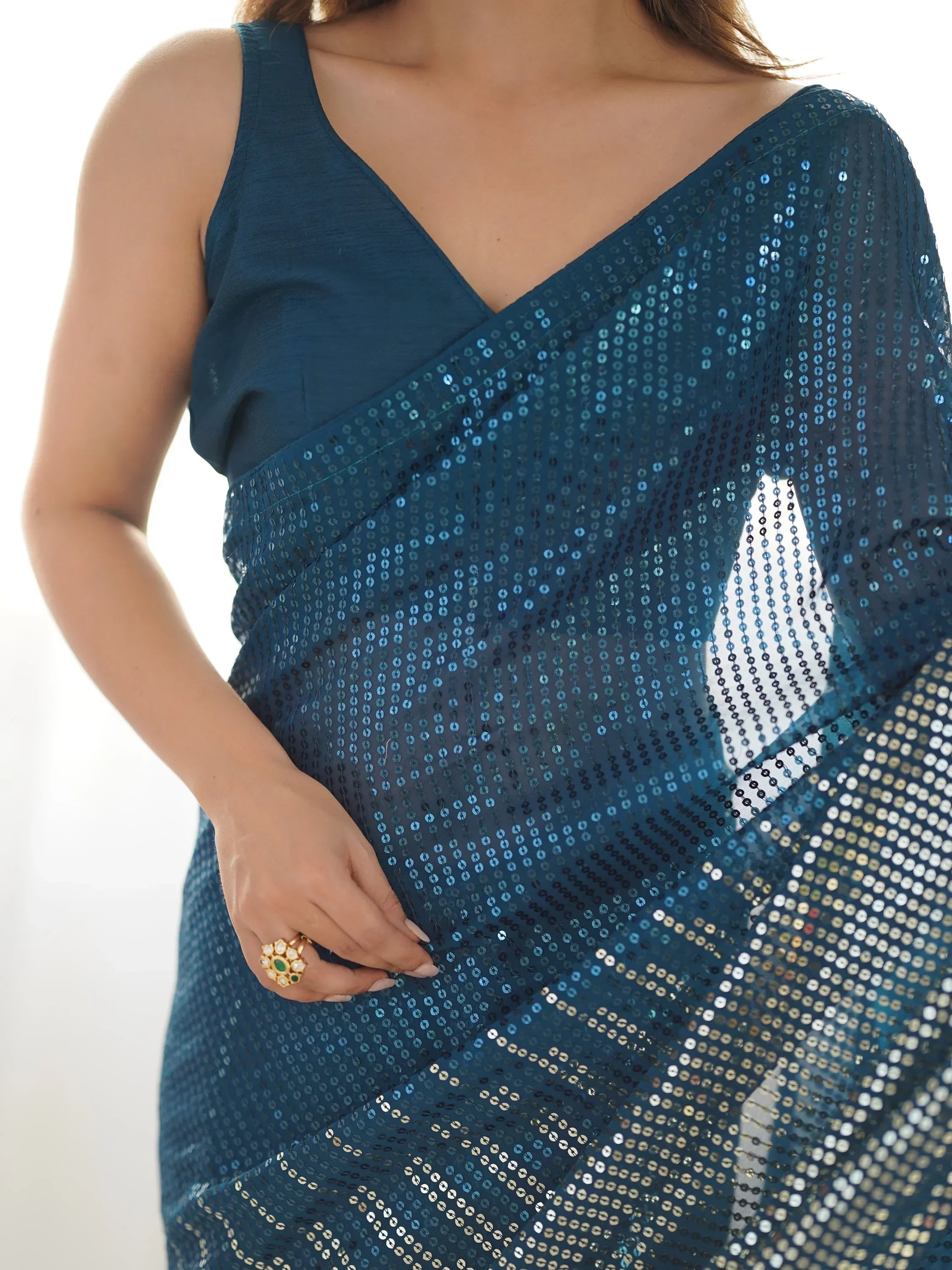 Teal Astonishing Sequins Georgette Reception Wear Saree With Blouse
