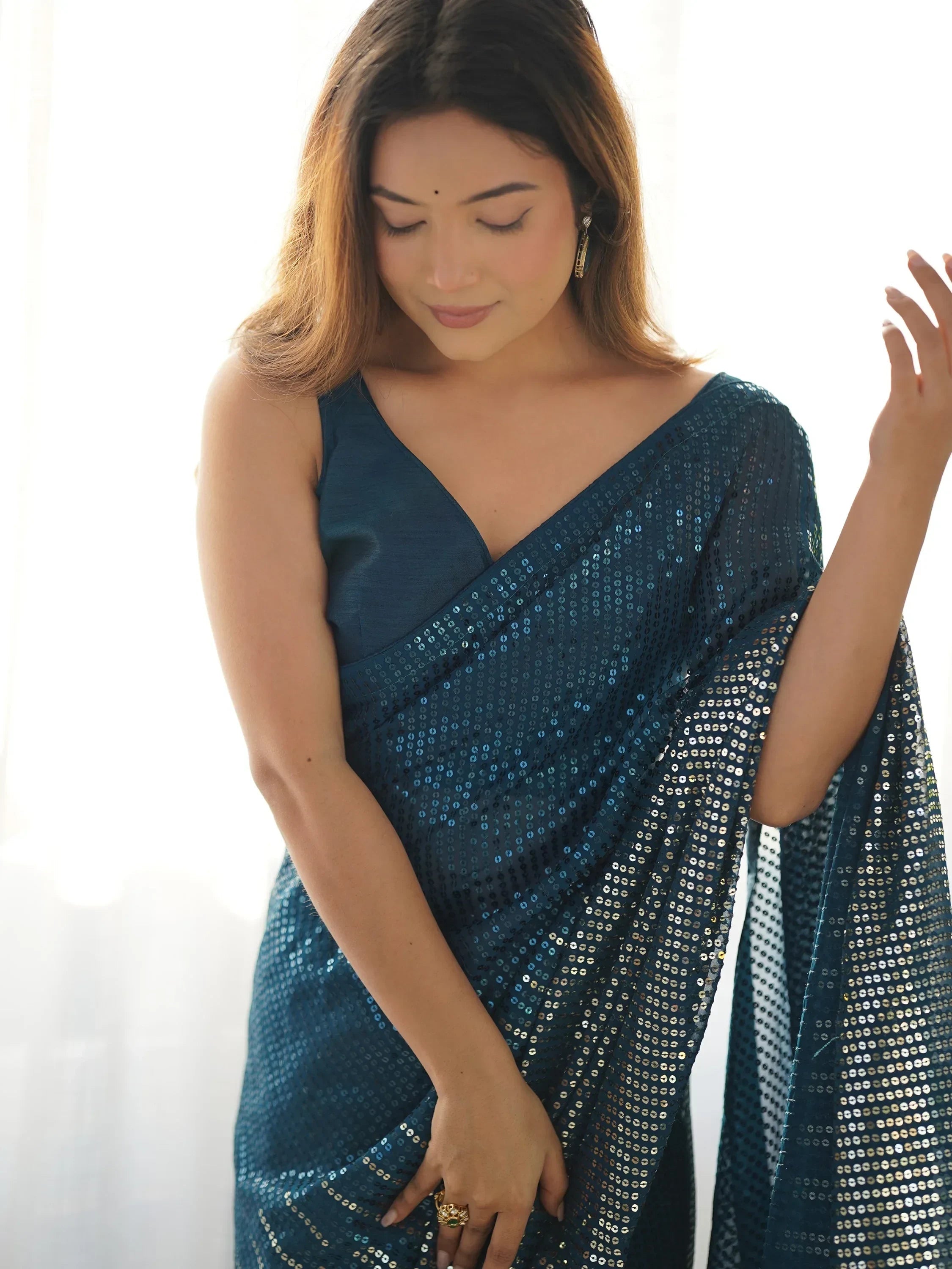 Teal Astonishing Sequins Georgette Reception Wear Saree With Blouse