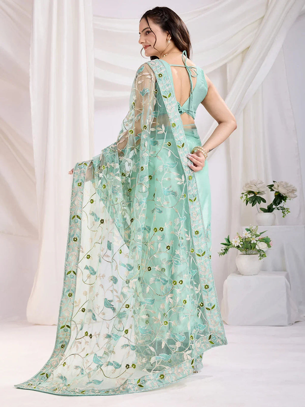 Sea Green Marvelous Thread Embroidered Net Party Wear Saree With Blouse