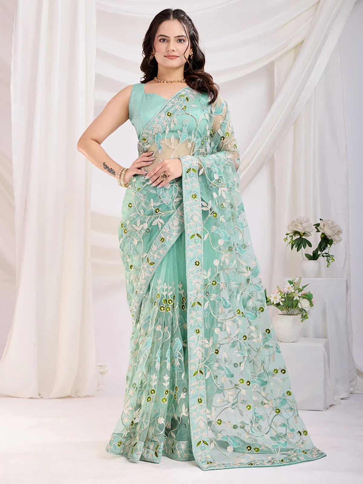Sea Green Marvelous Thread Embroidered Net Party Wear Saree With Blouse
