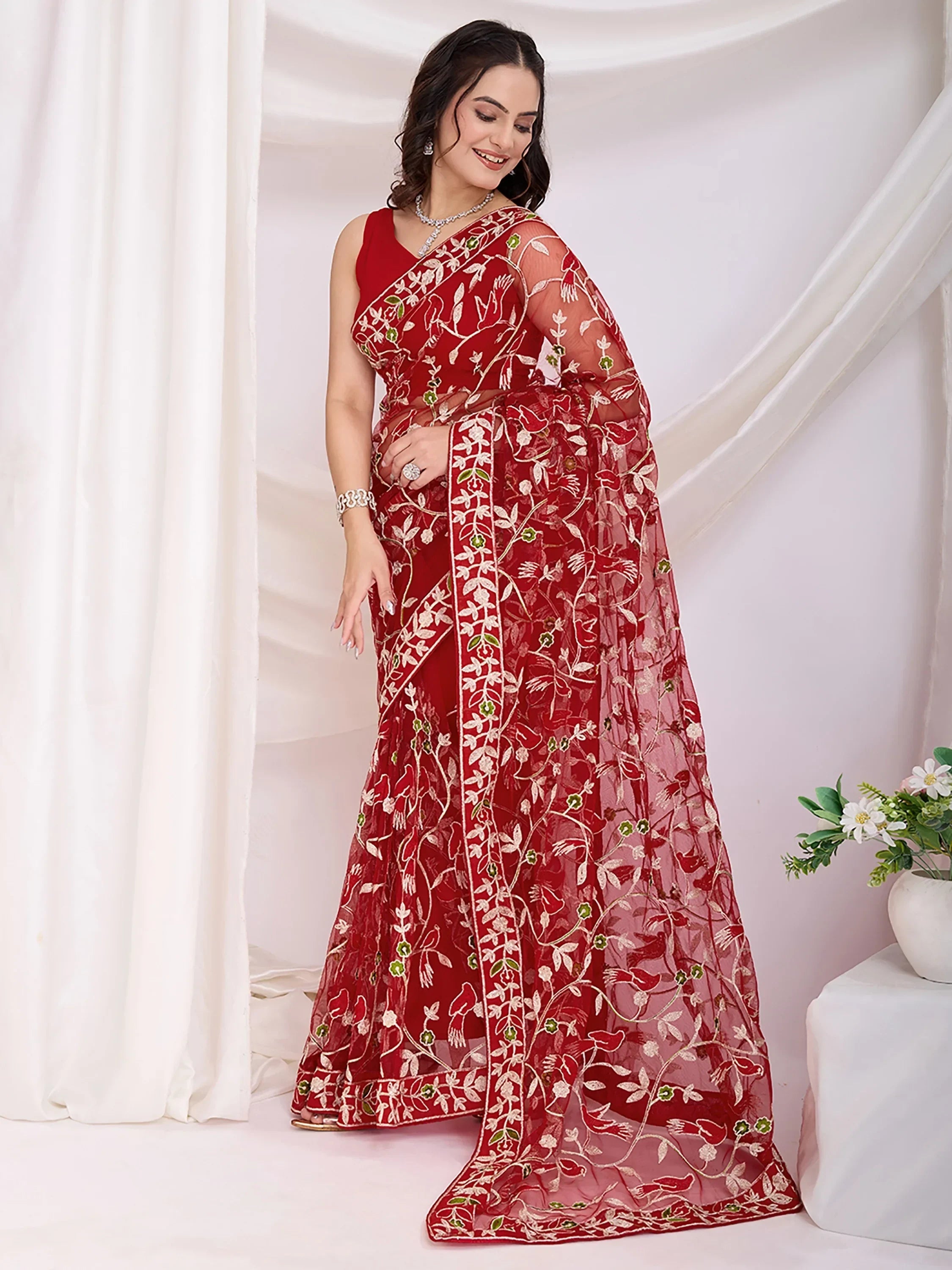 Maroon Marvelous Thread Embroidered Net Party Wear Saree With Blouse