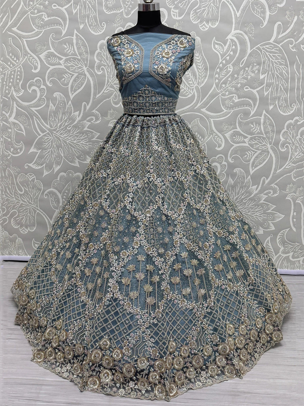 Blue Alluring Thread Embroidered Net Wedding Lehenga Choli