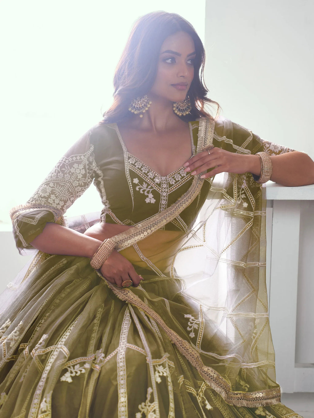 Adorable Olive Green Sequins Net Mehendi Wear Lehenga Choli