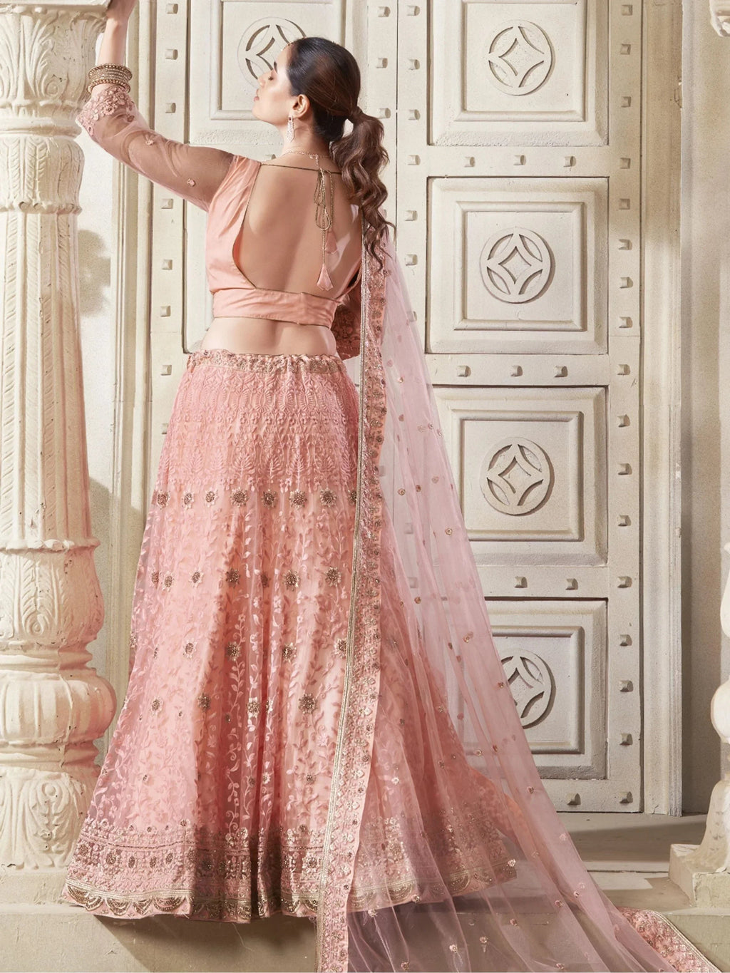 Adorable Peach Color Thread Work Net Engagement Wear Lehenga Choli