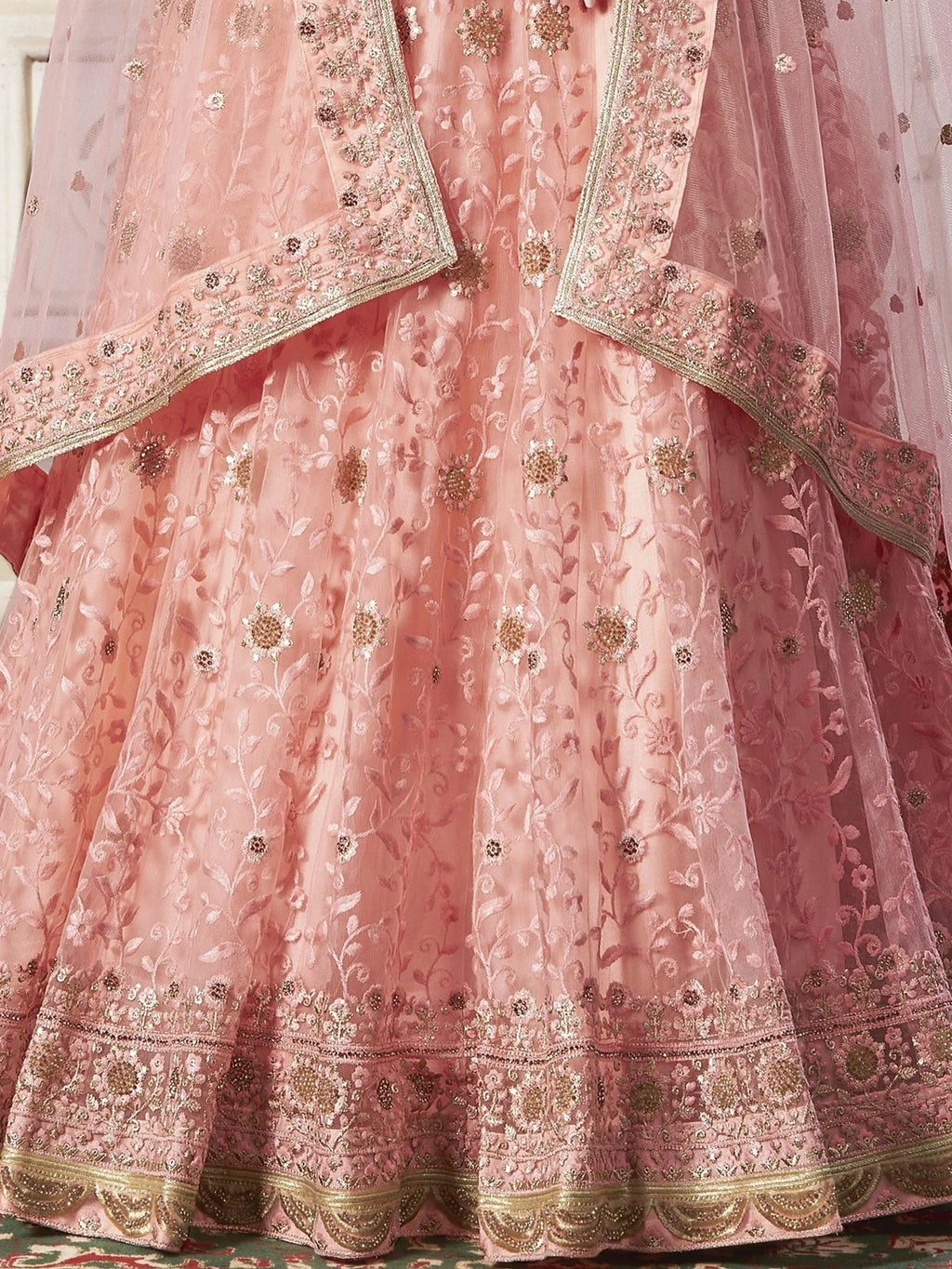 Adorable Peach Color Thread Work Net Engagement Wear Lehenga Choli