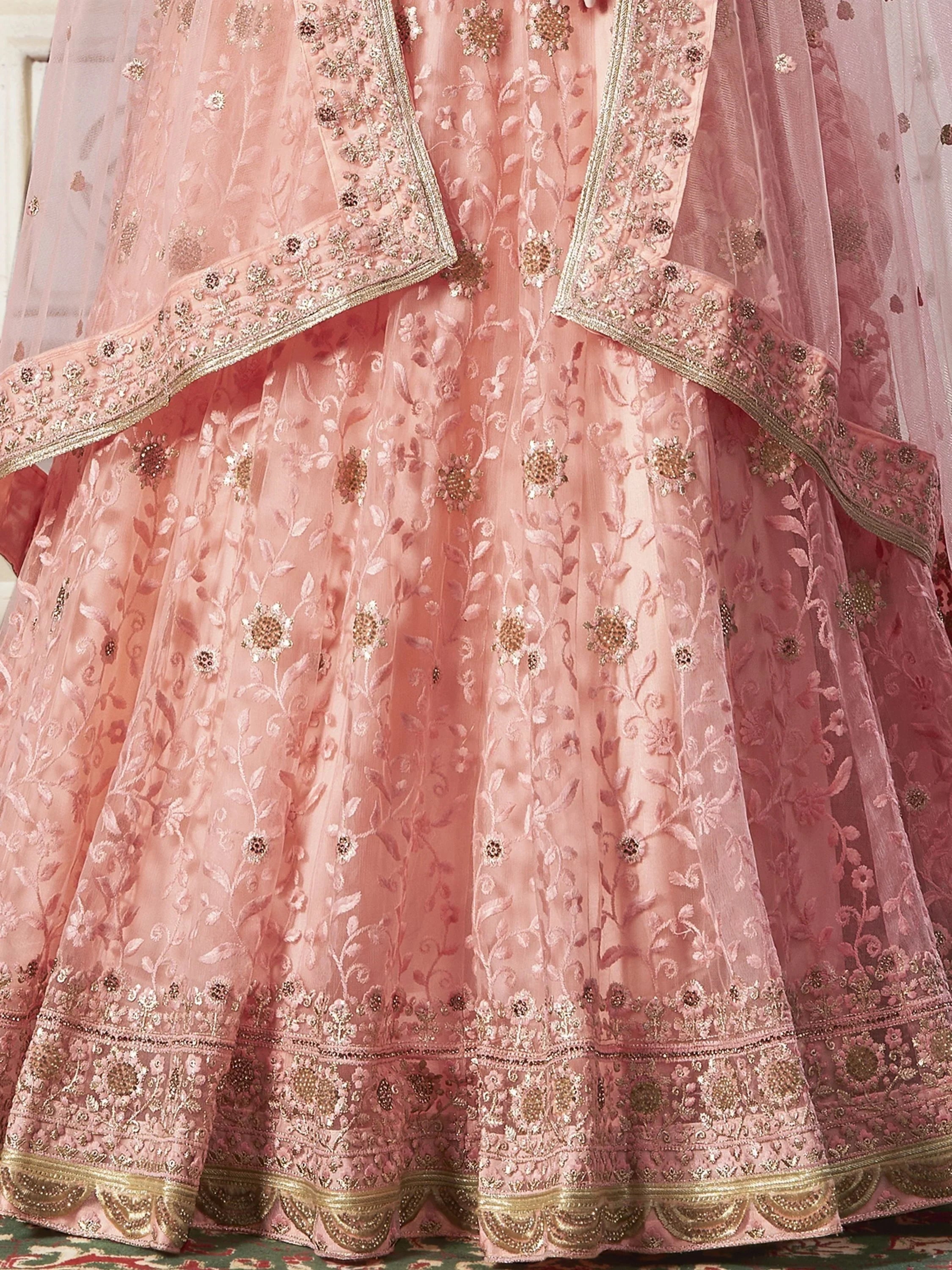 Adorable Peach Color Thread Work Net Engagement Wear Lehenga Choli