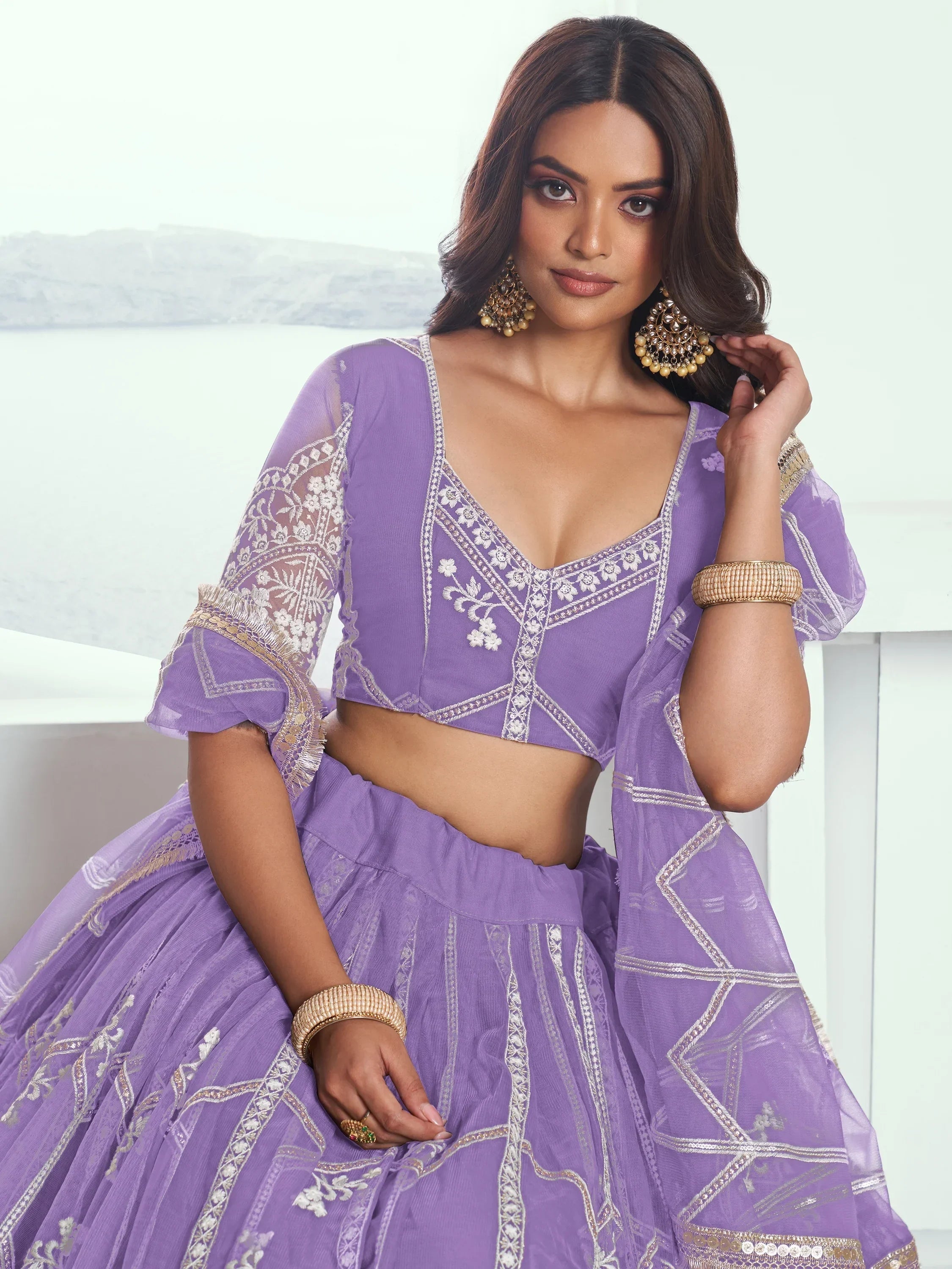 Alluring Lavender Thread Work Net Engagement Wear Lehenga Choli