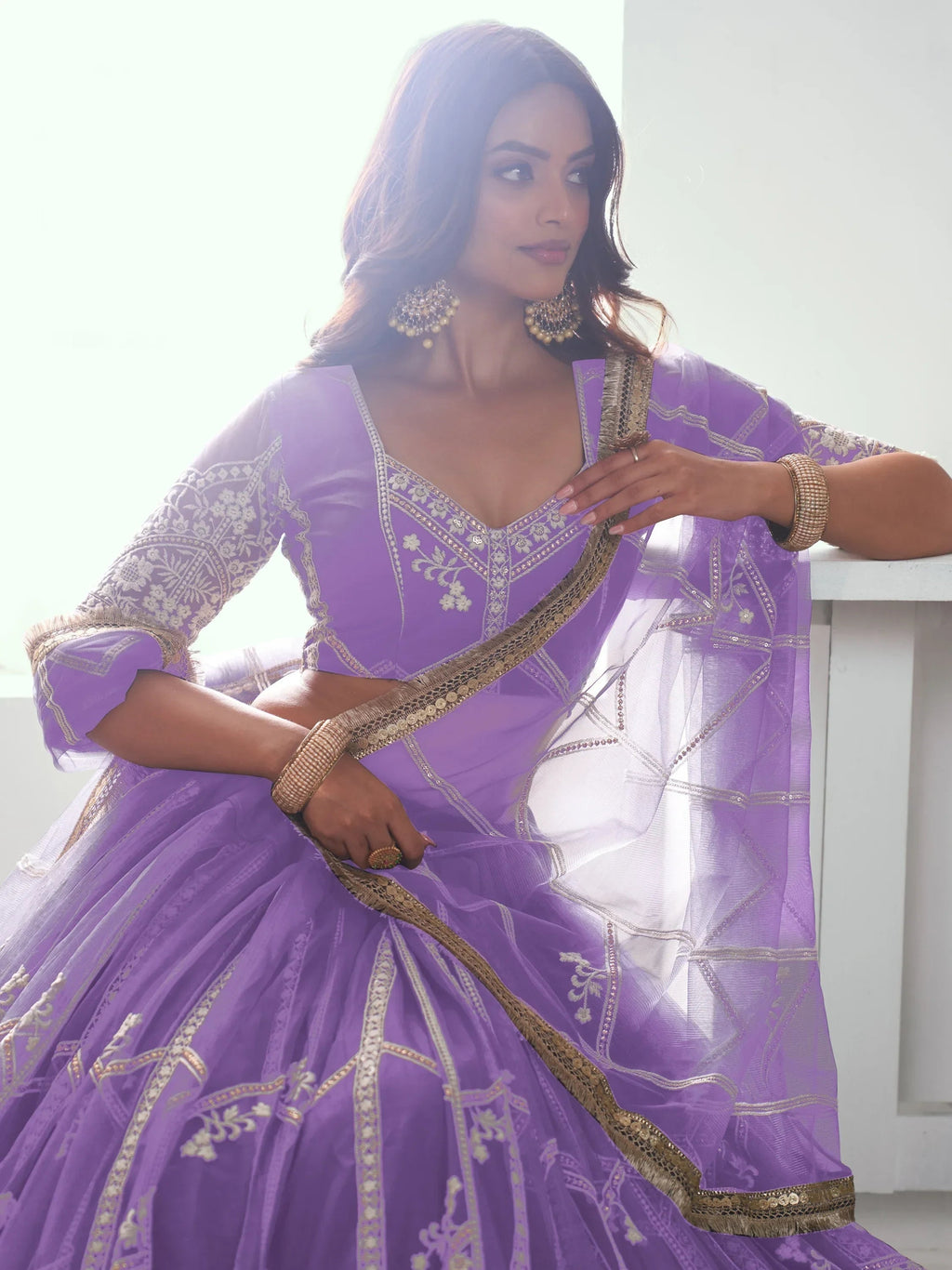 Alluring Lavender Thread Work Net Engagement Wear Lehenga Choli
