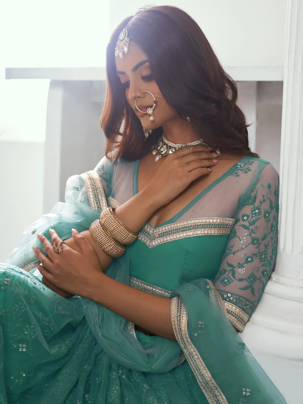 Amazing Rama Color Embroidered Net Engagement Wear Lehenga Choli