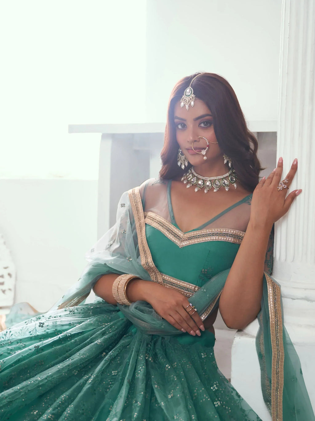 Amazing Rama Color Embroidered Net Engagement Wear Lehenga Choli