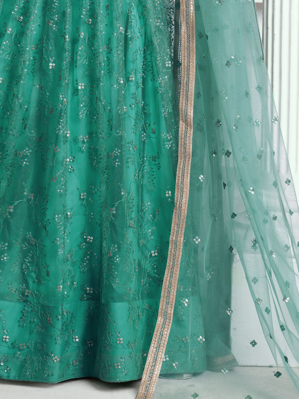 Amazing Rama Color Embroidered Net Engagement Wear Lehenga Choli