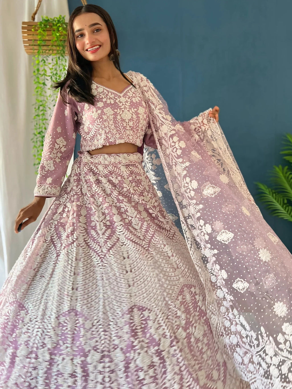 Astonishing Lilac Pearl Work Net Reception Wear Lehenga Choli