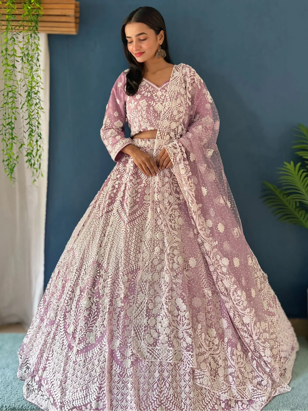 Astonishing Lilac Pearl Work Net Reception Wear Lehenga Choli