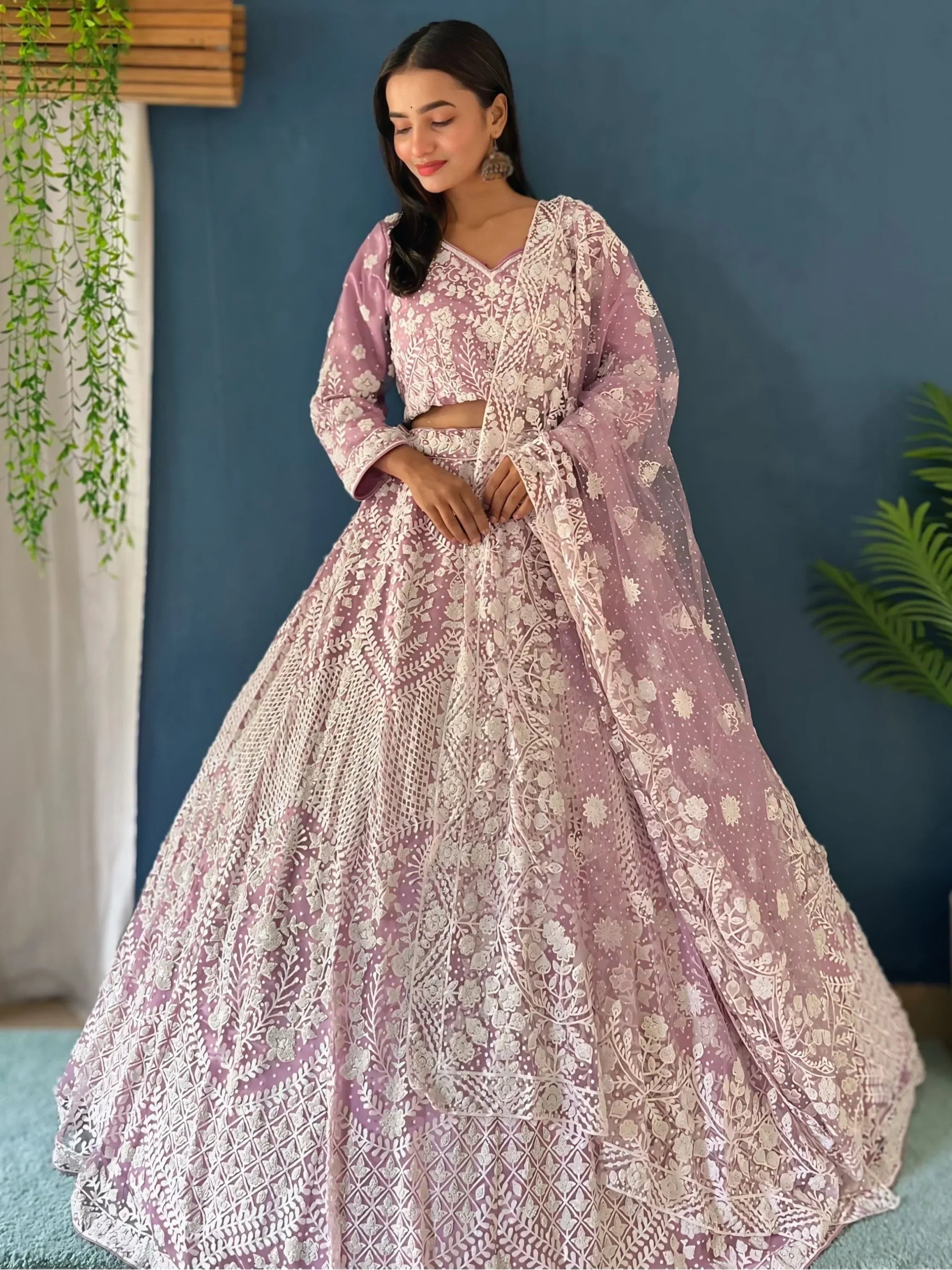 Astonishing Lilac Pearl Work Net Reception Wear Lehenga Choli