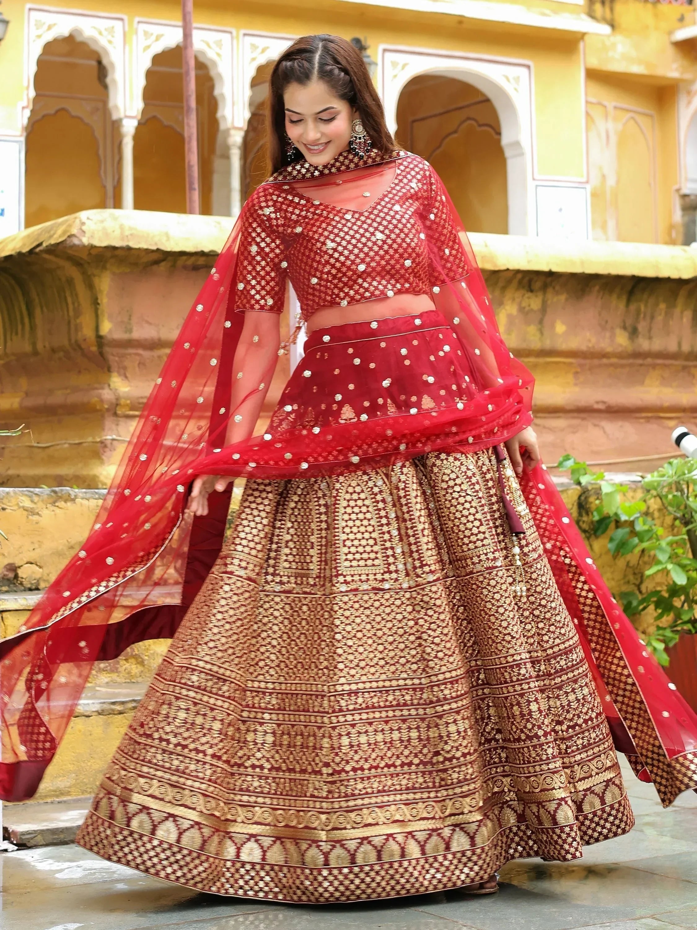 Astonishing Maroon Sequins Raw Silk Wedding Wear Lehenga Choli