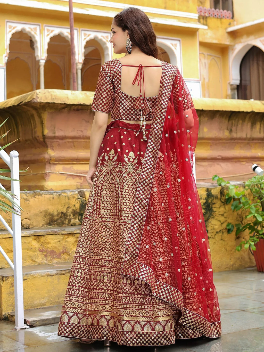 Astonishing Maroon Sequins Raw Silk Wedding Wear Lehenga Choli