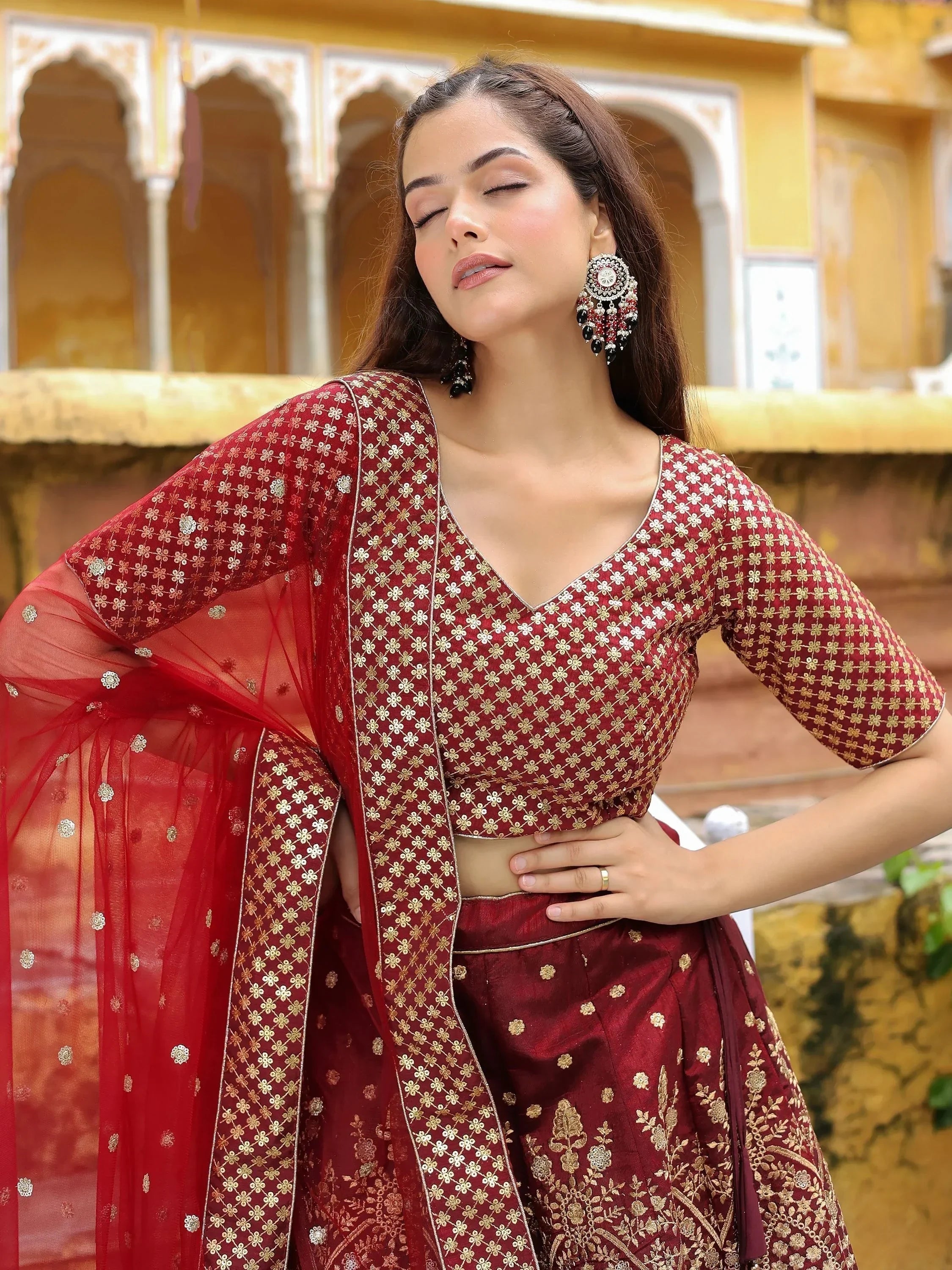 Astonishing Maroon Sequins Raw Silk Wedding Wear Lehenga Choli