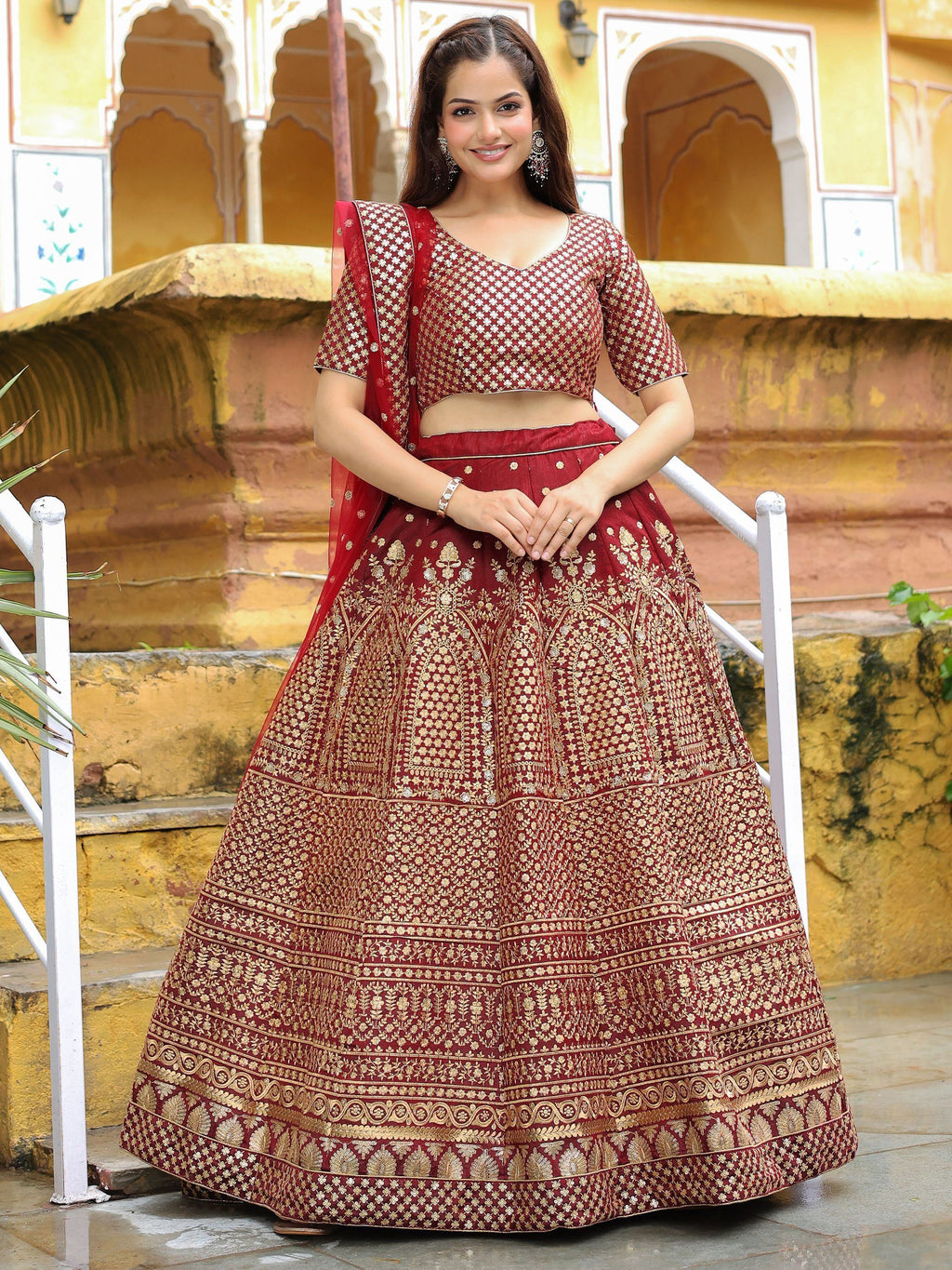 Astonishing Maroon Sequins Raw Silk Wedding Wear Lehenga Choli