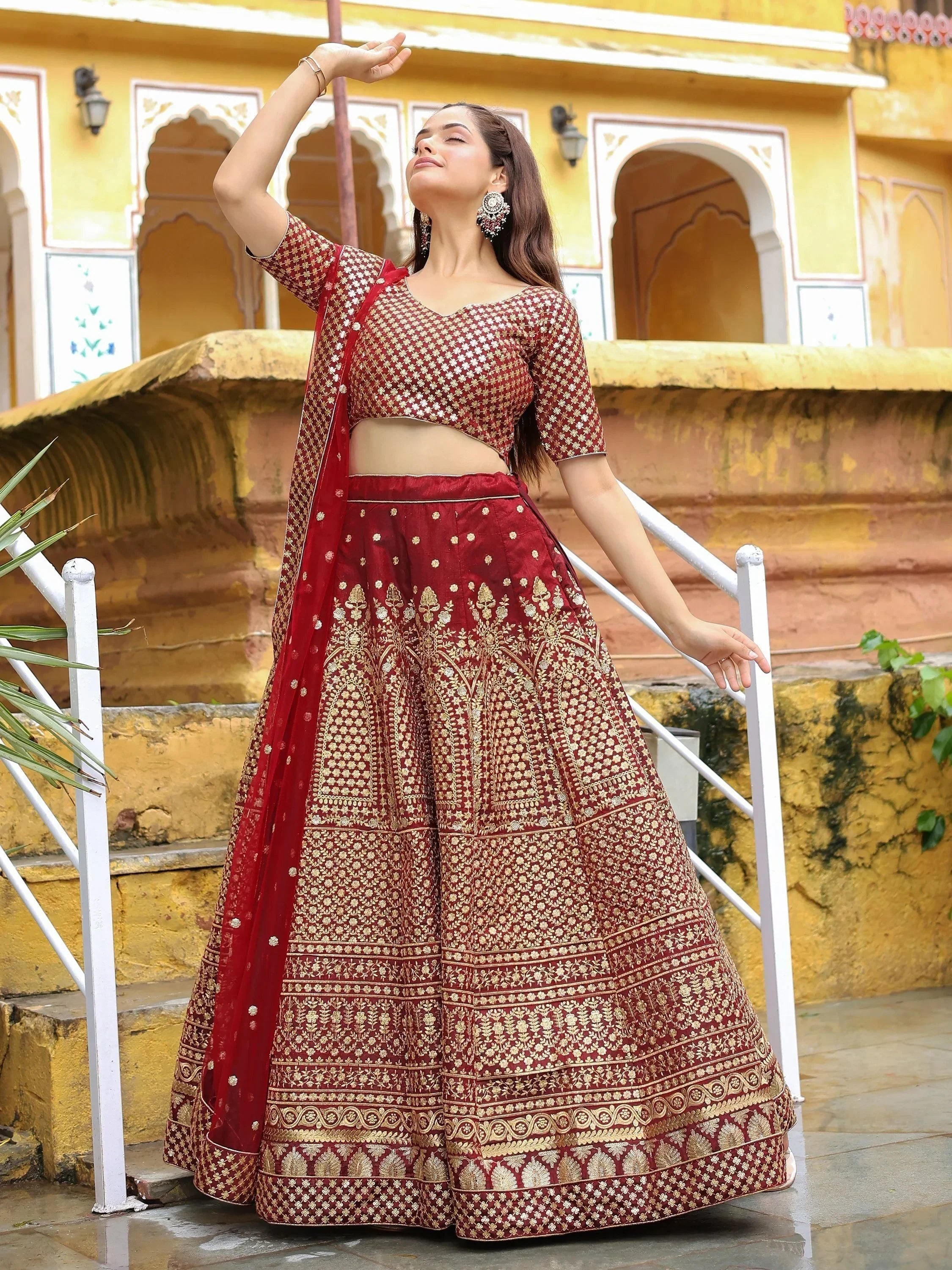 Astonishing Maroon Sequins Raw Silk Wedding Wear Lehenga Choli
