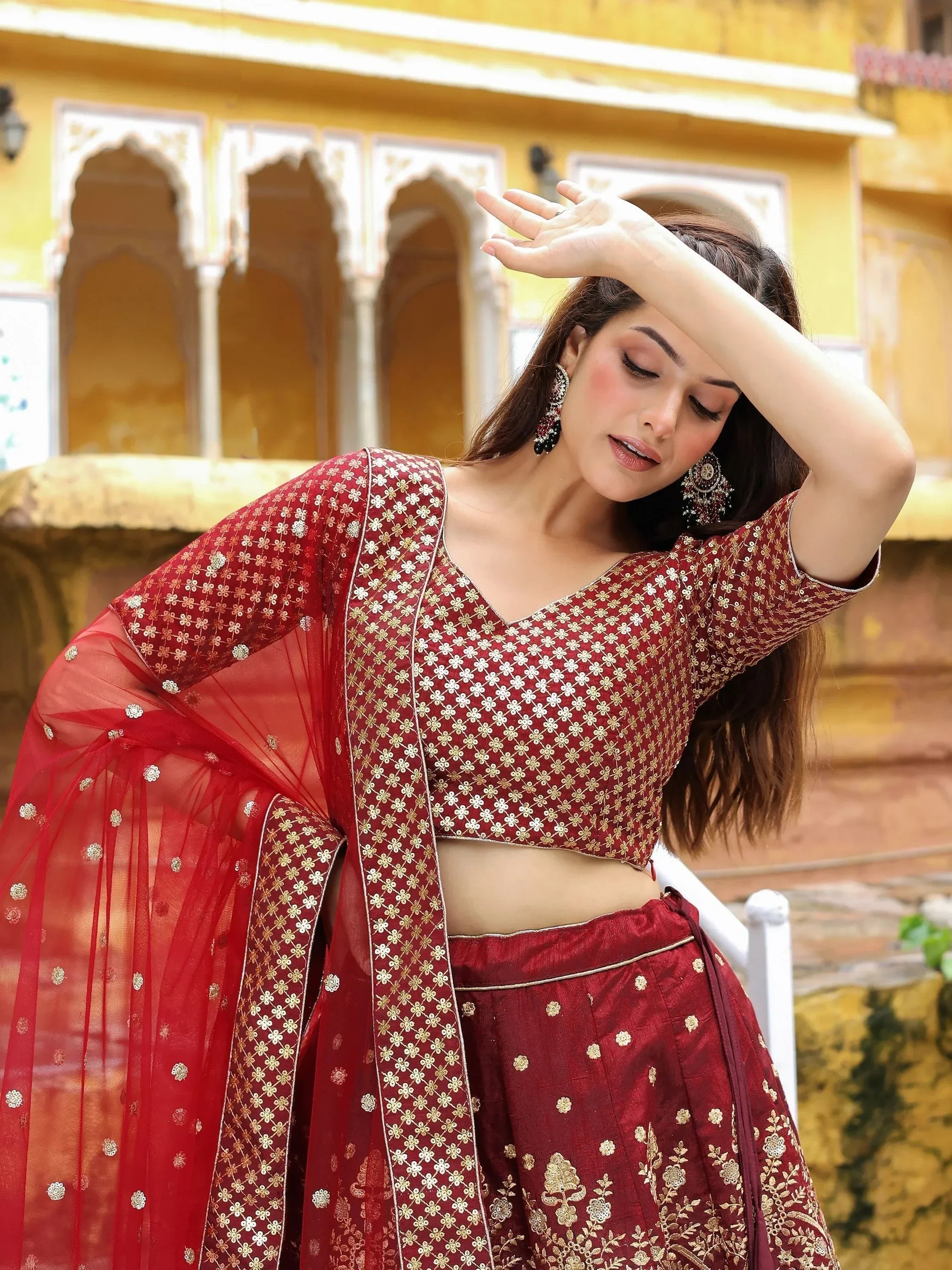 Astonishing Maroon Sequins Raw Silk Wedding Wear Lehenga Choli