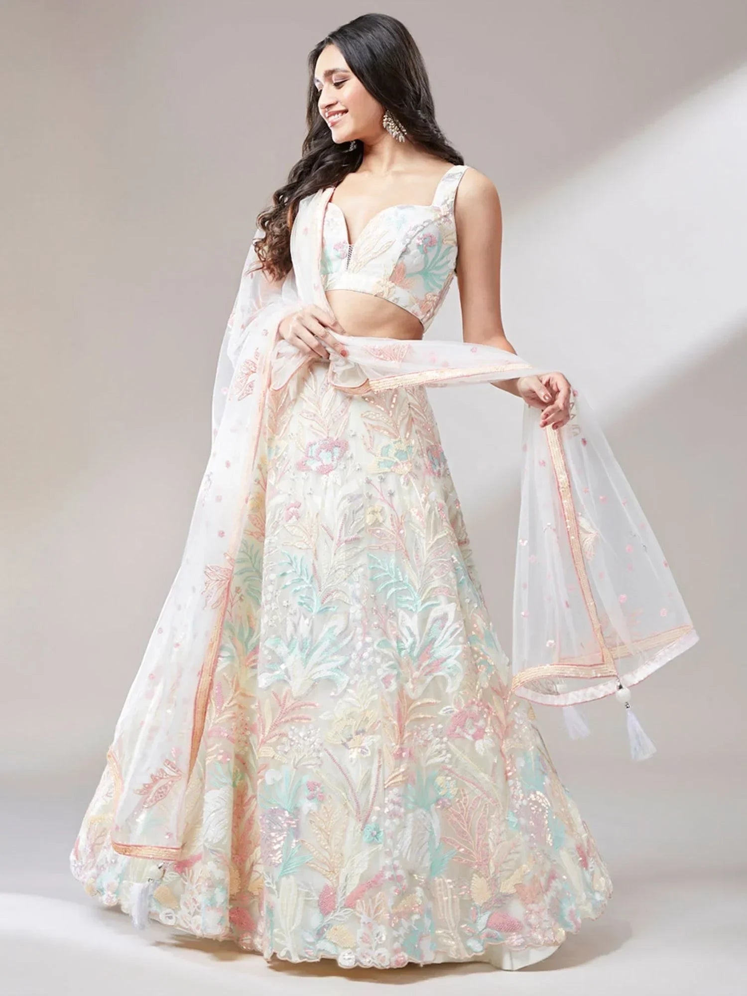 Off White Ravishing Color Sequins Soft Net Party Wear Lehenga Choli