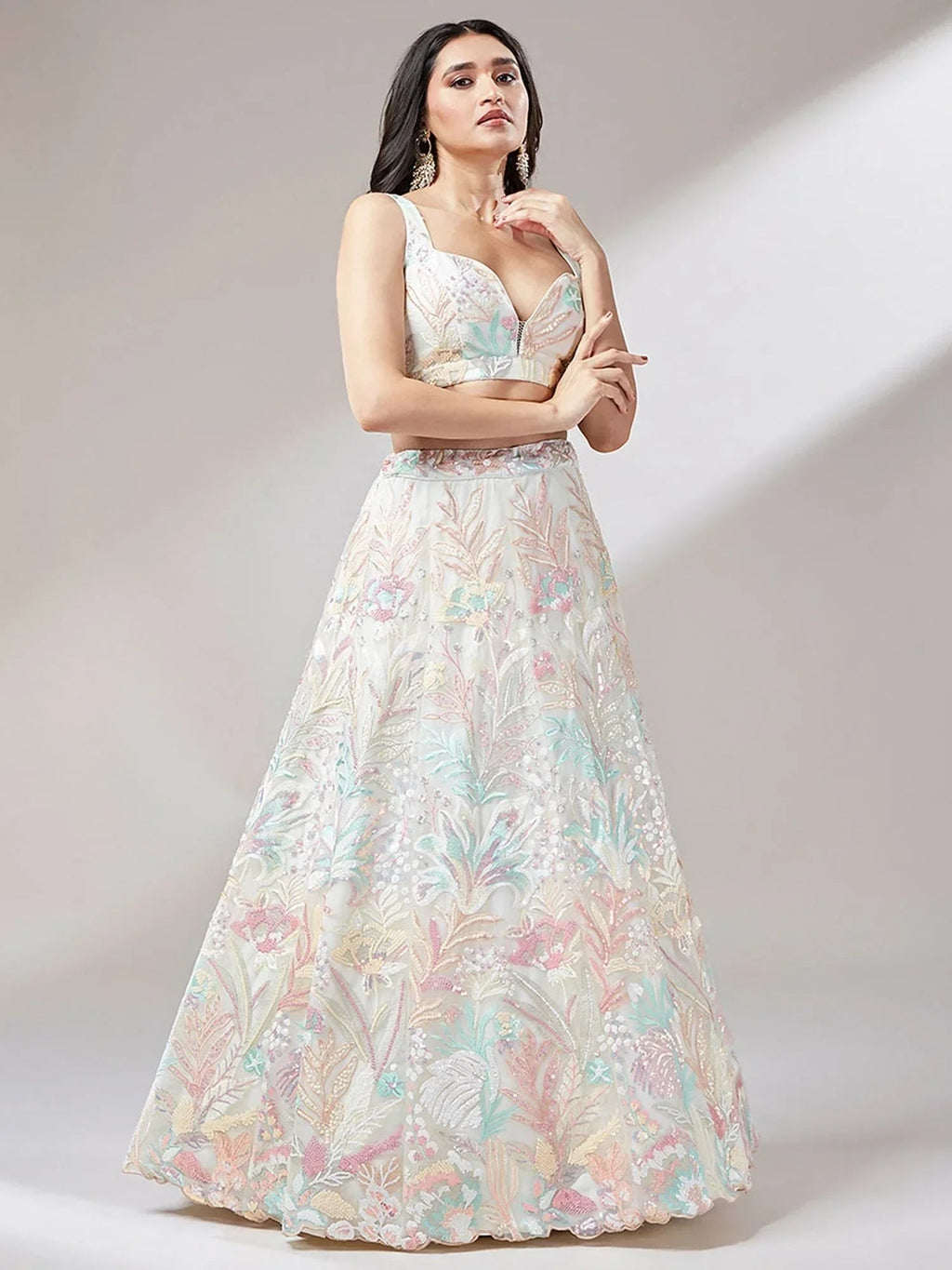 Off White Ravishing Color Sequins Soft Net Party Wear Lehenga Choli