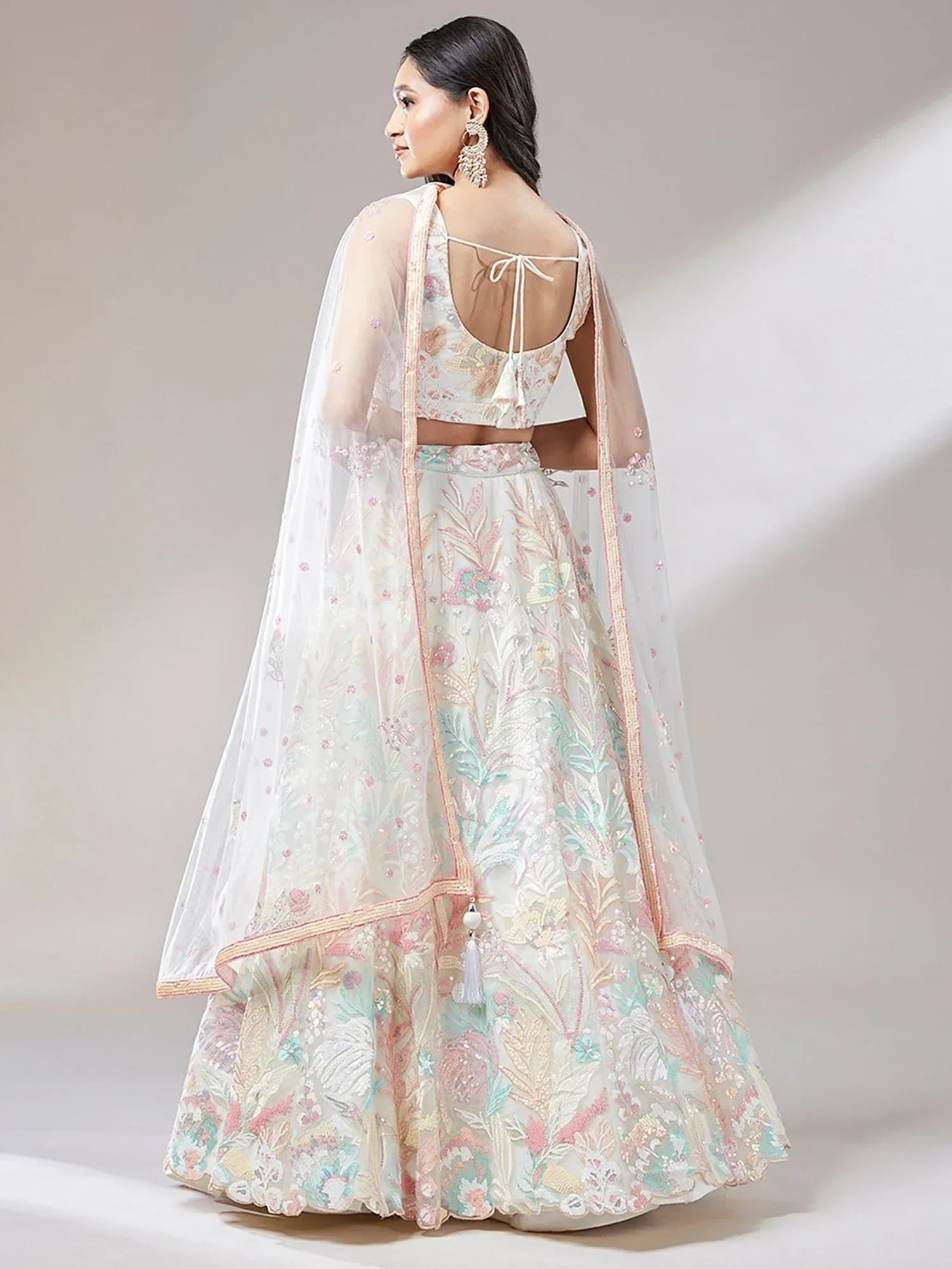 Off White Ravishing Color Sequins Soft Net Party Wear Lehenga Choli