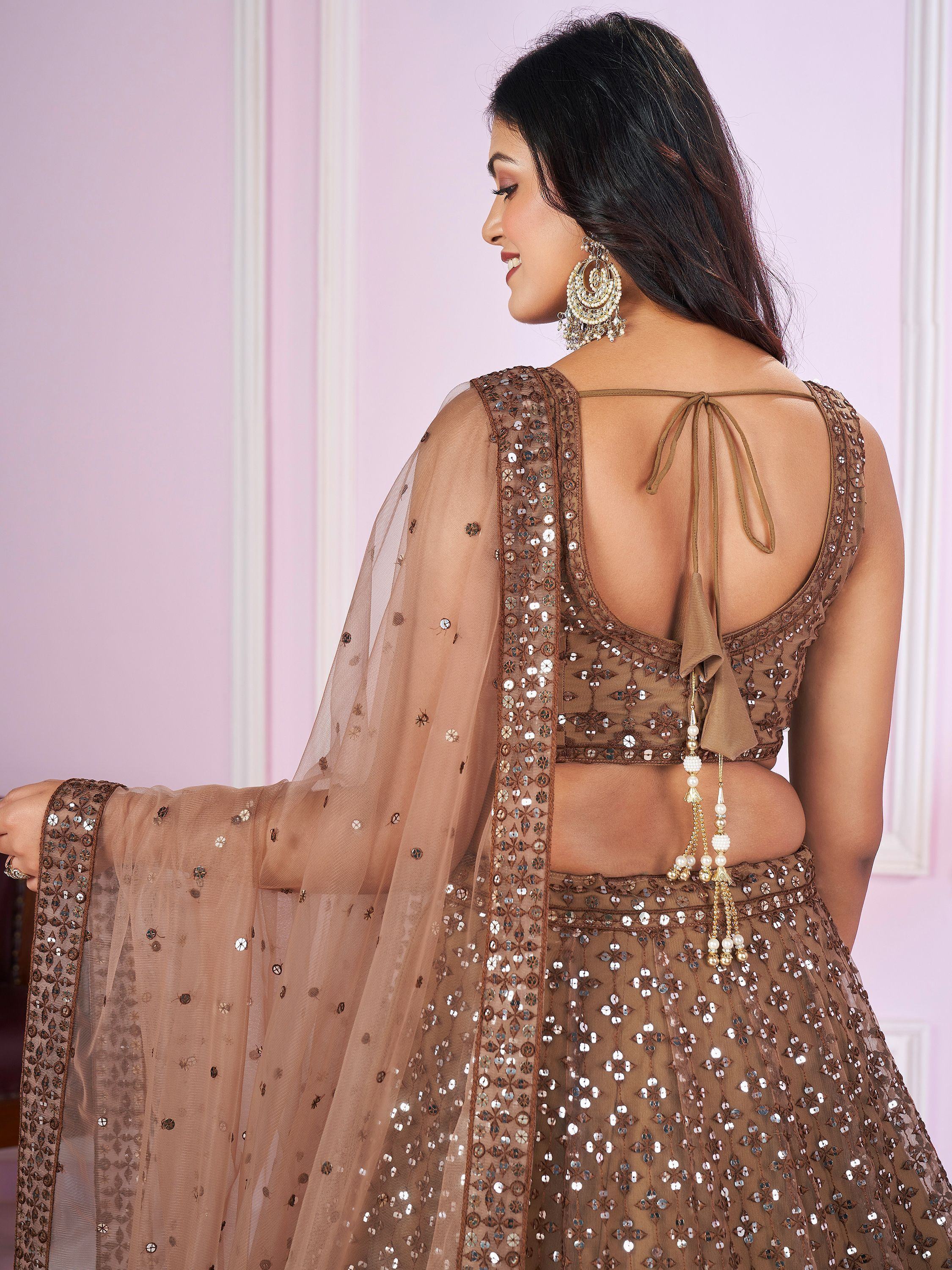 Attractive Brown Sequins Soft Net Engagement Wear Lehenga Choli