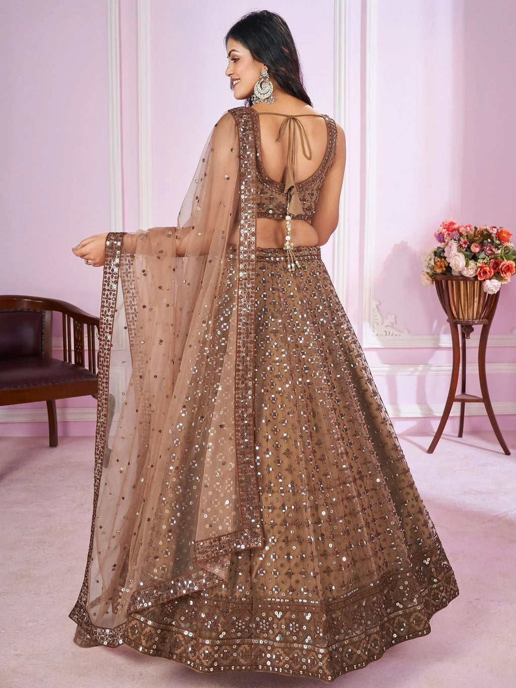 Attractive Brown Sequins Soft Net Engagement Wear Lehenga Choli