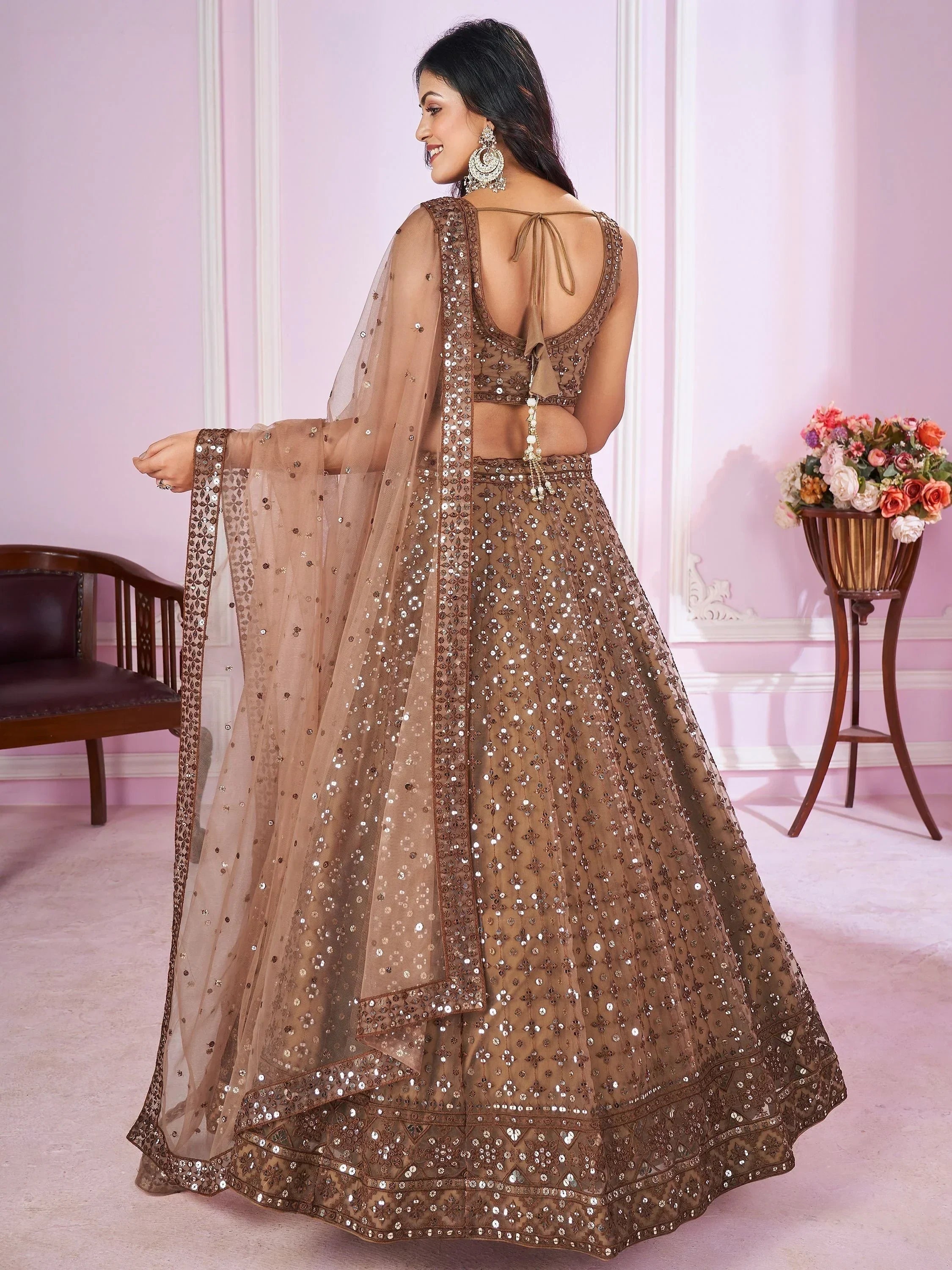 Attractive Brown Sequins Soft Net Engagement Wear Lehenga Choli