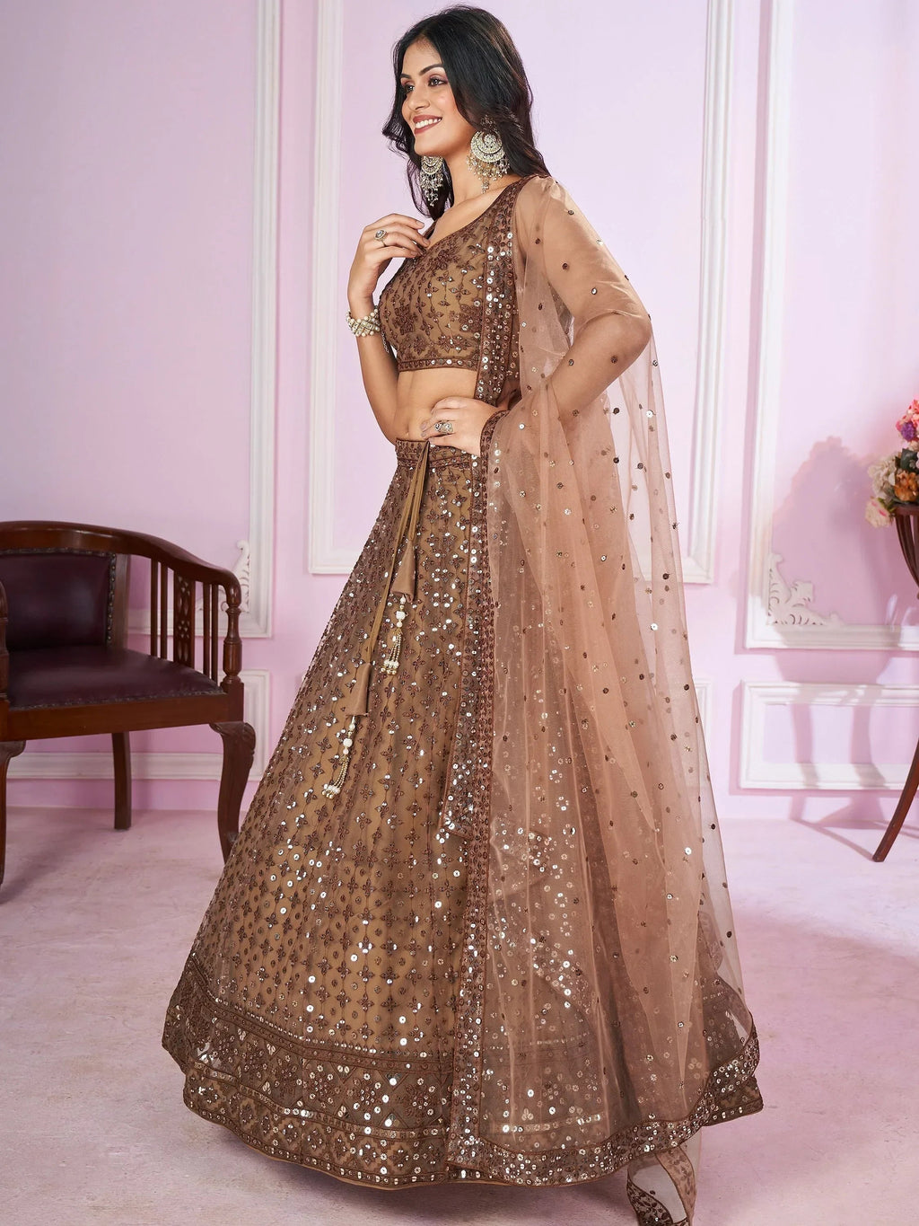 Attractive Brown Sequins Soft Net Engagement Wear Lehenga Choli