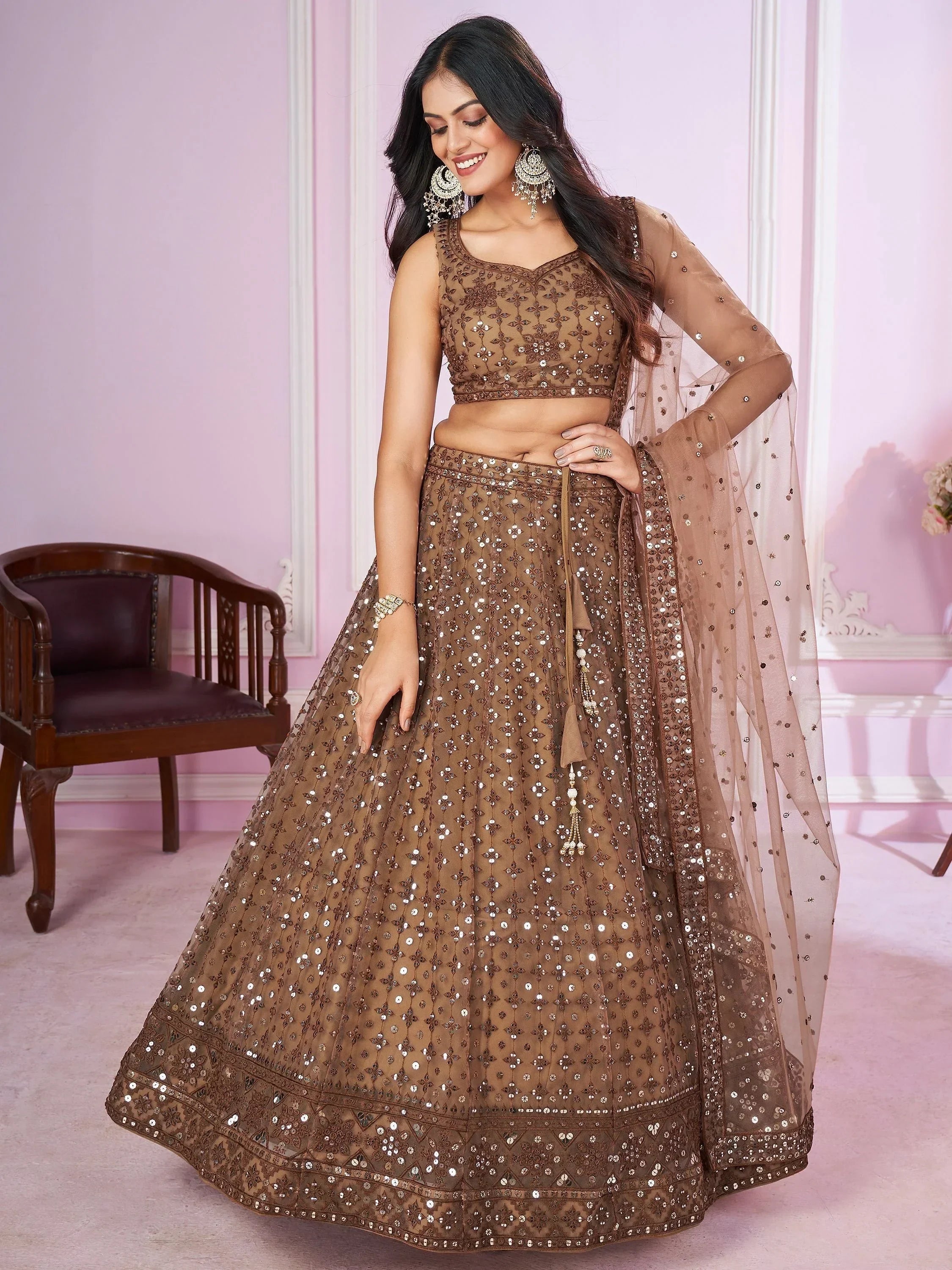 Attractive Brown Sequins Soft Net Engagement Wear Lehenga Choli