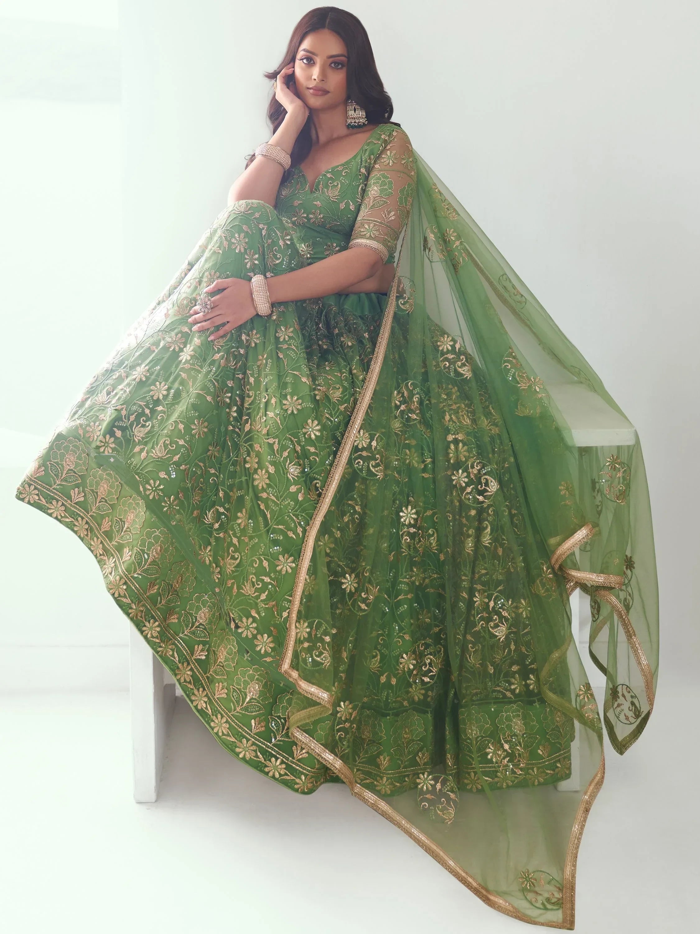 Attractive Green Color Embroidered Net Mehendi Wear Lehenga Choli