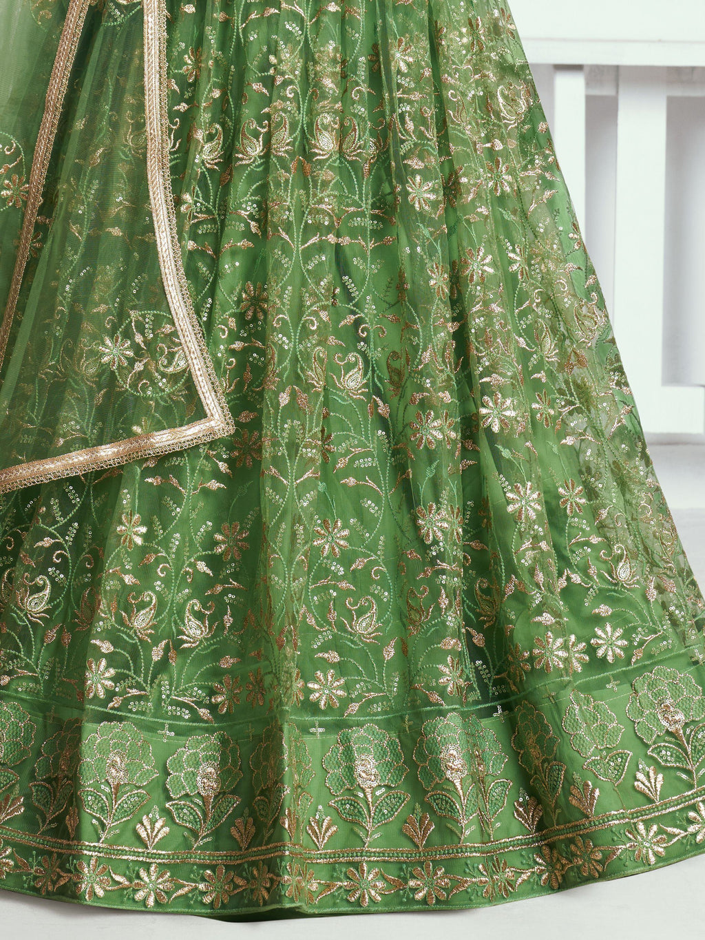 Attractive Green Color Embroidered Net Mehendi Wear Lehenga Choli